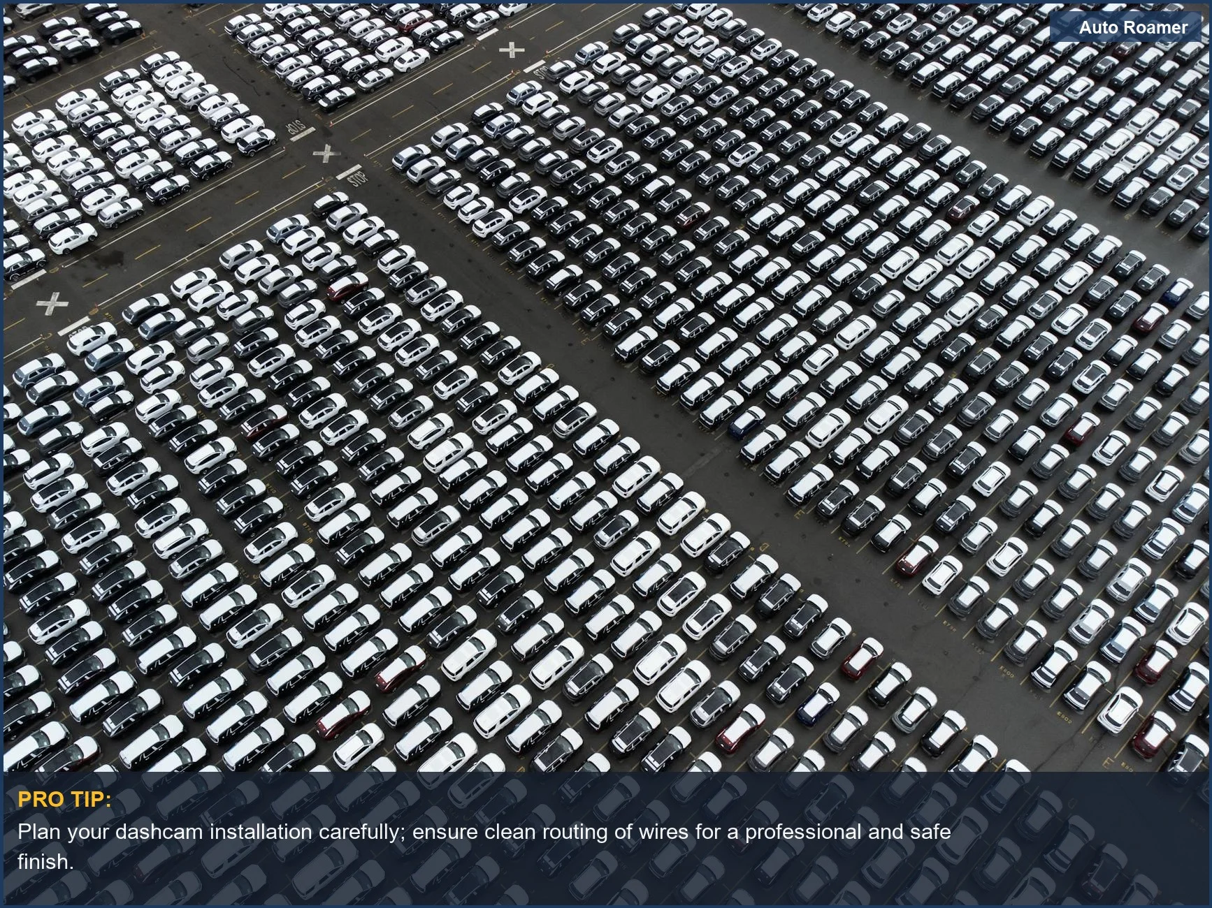 Aerial perspective of an organized car parking lot, perfect for understanding dashcam installation options.