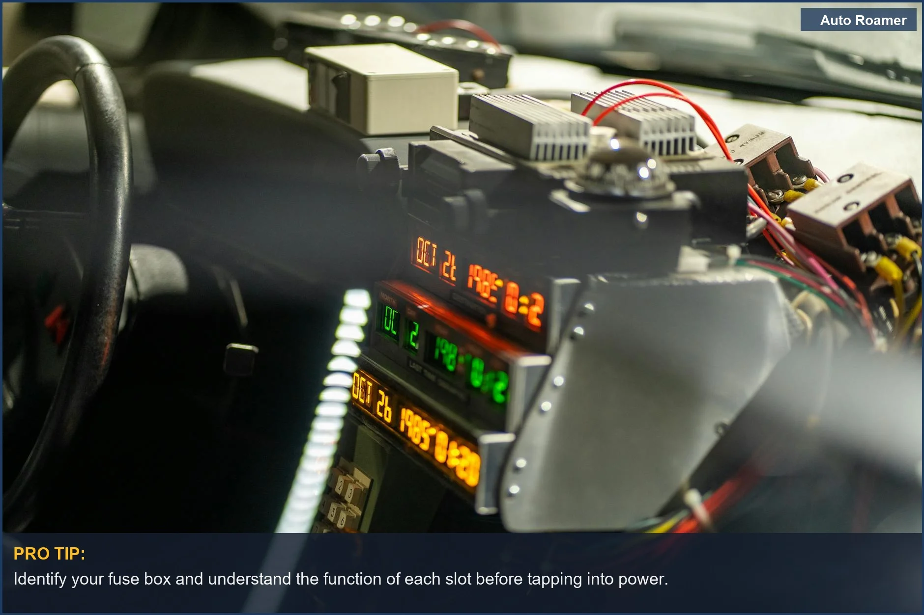 Intricate dashboard of a high-tech vehicle with digital displays and visible wiring for advanced systems.