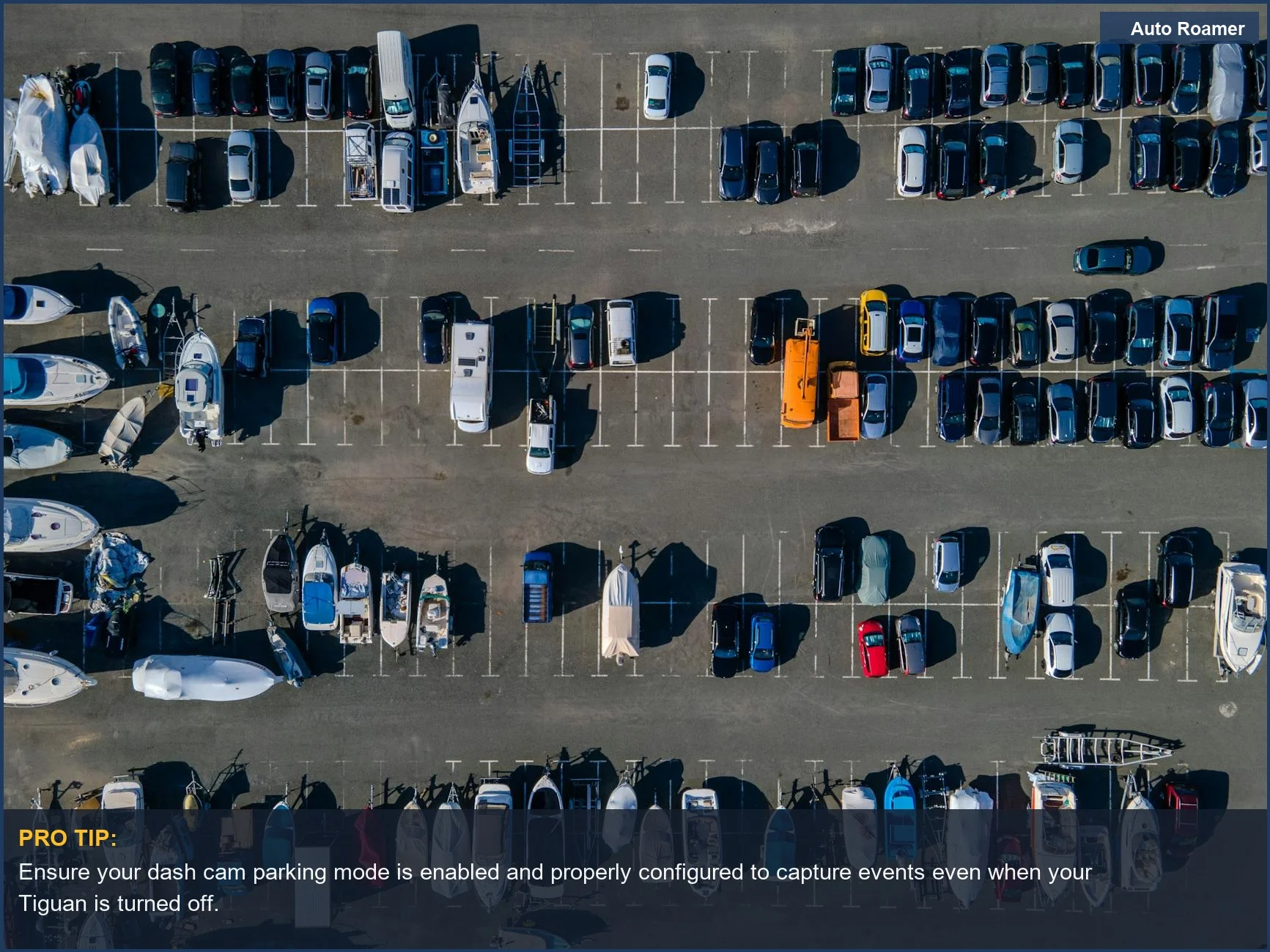 Parked Volkswagen Tiguan in a sunny lot, illustrating dash cam parking mode considerations.