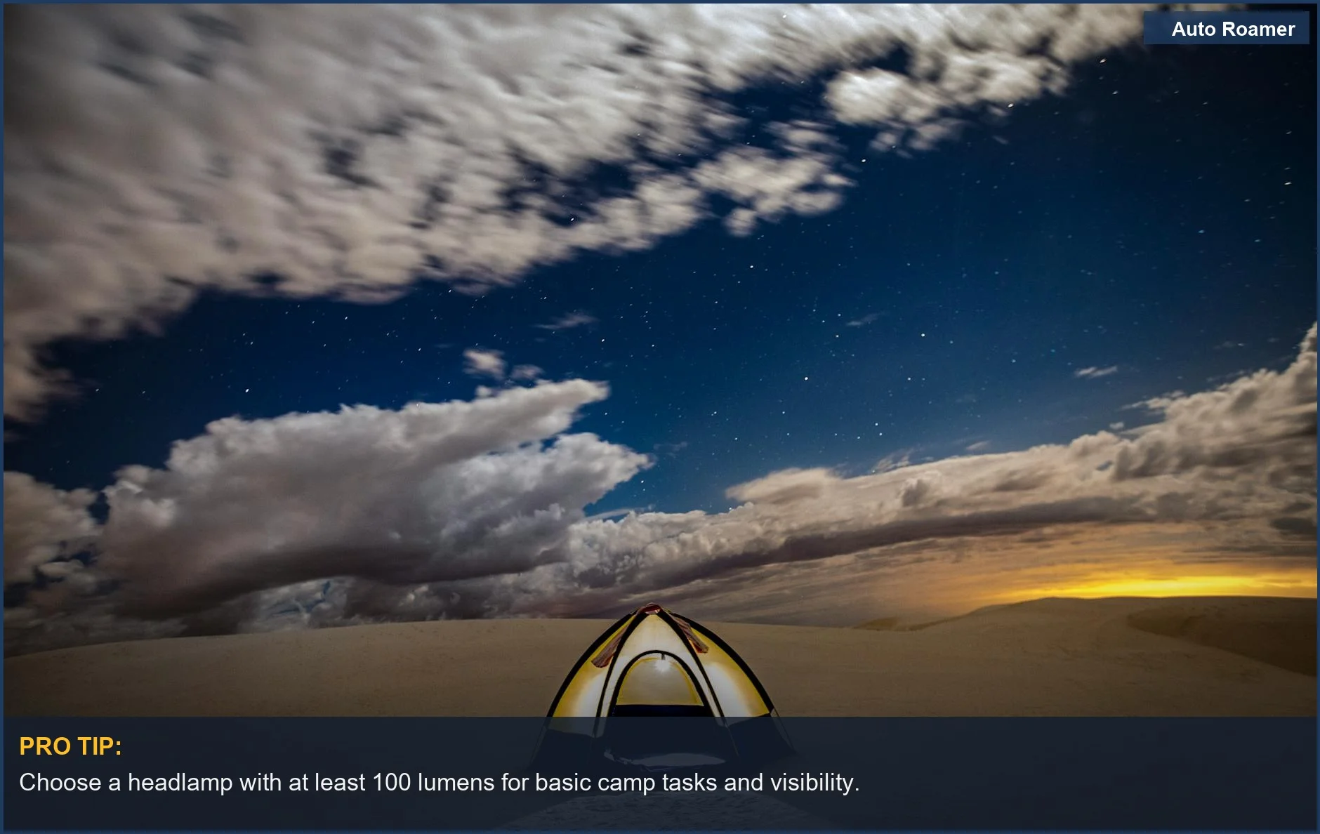Solitary desert tent under starry night sky showcases the need for adequate car camping lighting.