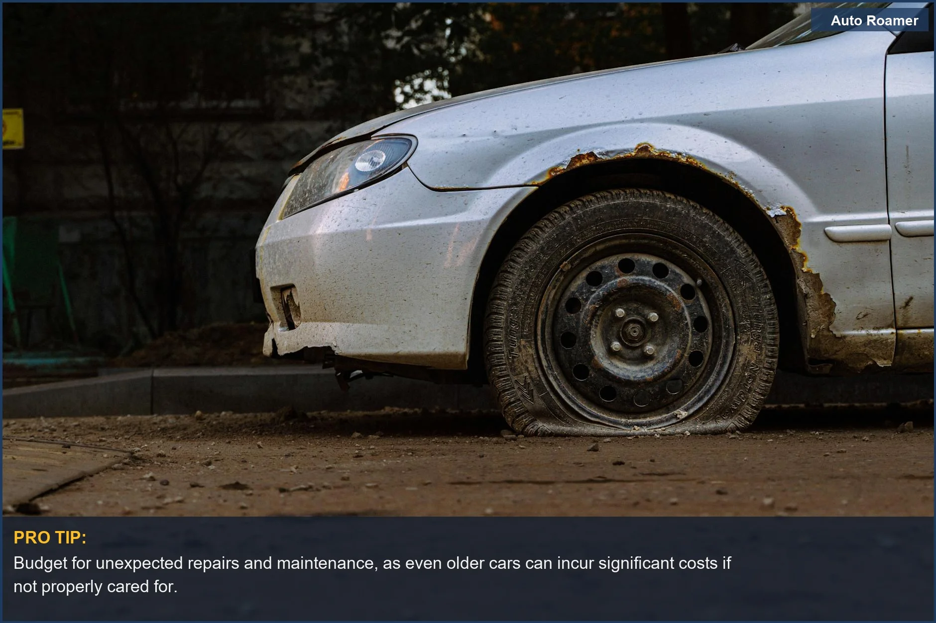 Rusted car with flat tire on a city street symbolizes the decay and ongoing expenses of neglected vehicles.