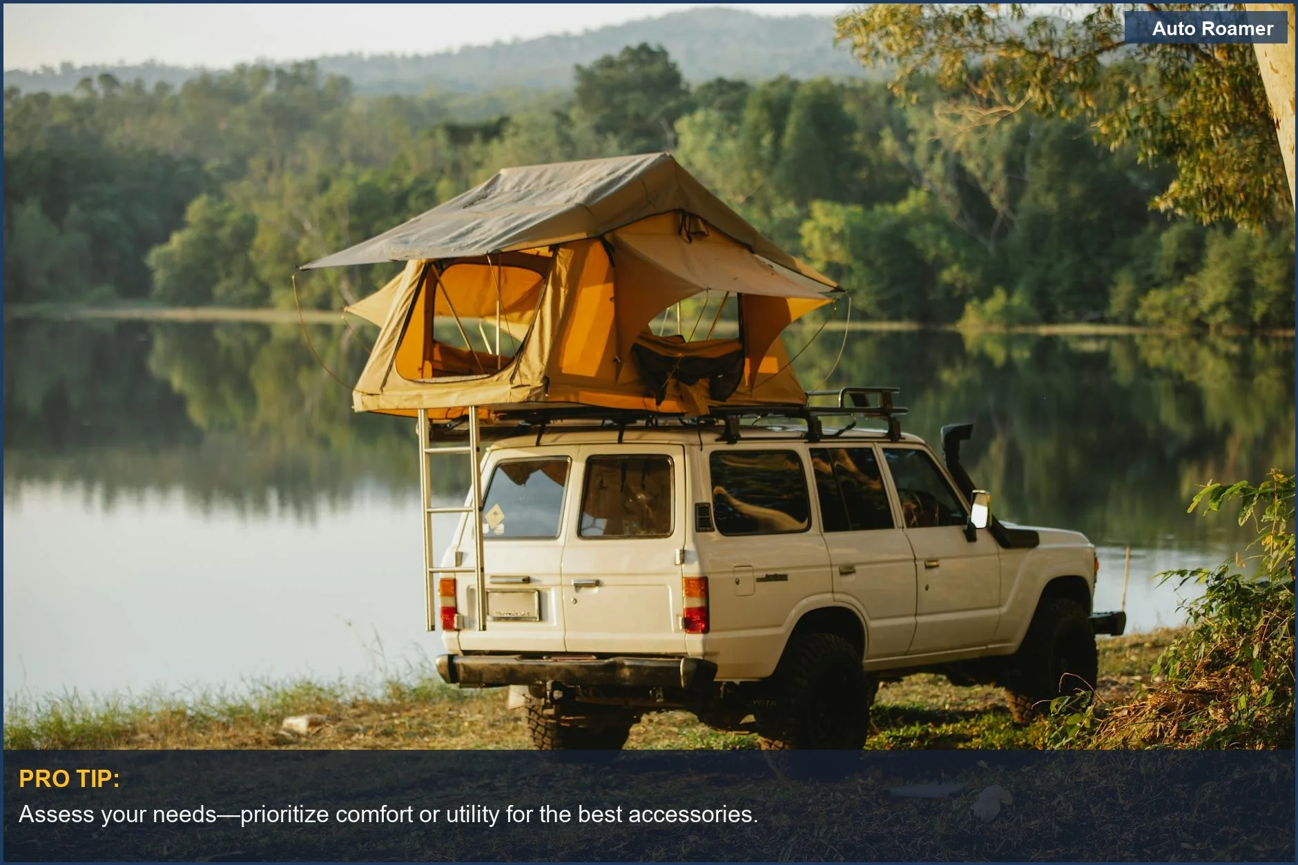 Honda Pilot with a rooftop tent parked by a serene lake surrounded by trees