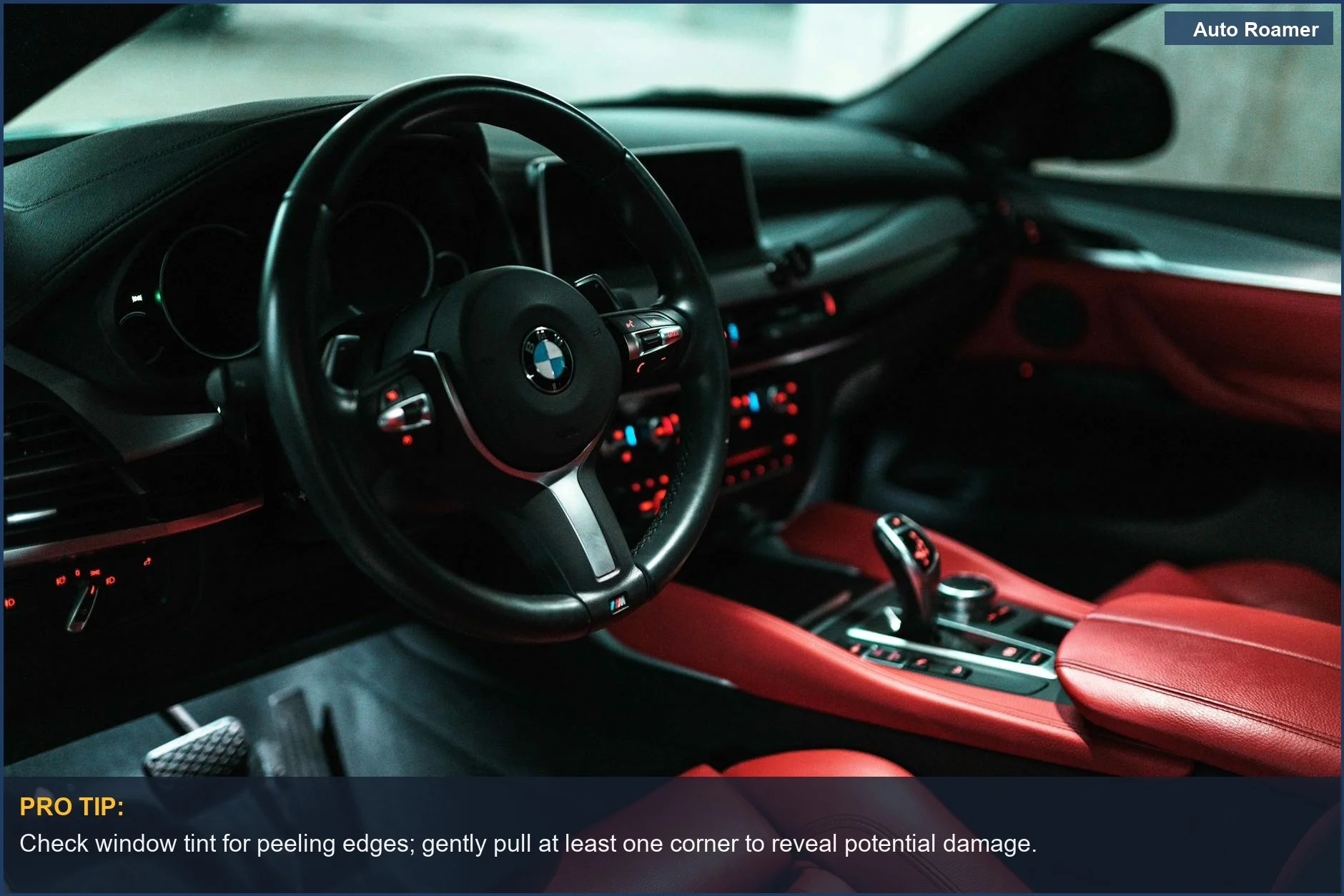 Luxury car interior with red leather seats and a modern dashboard, relevant to used car inspection for buyers.