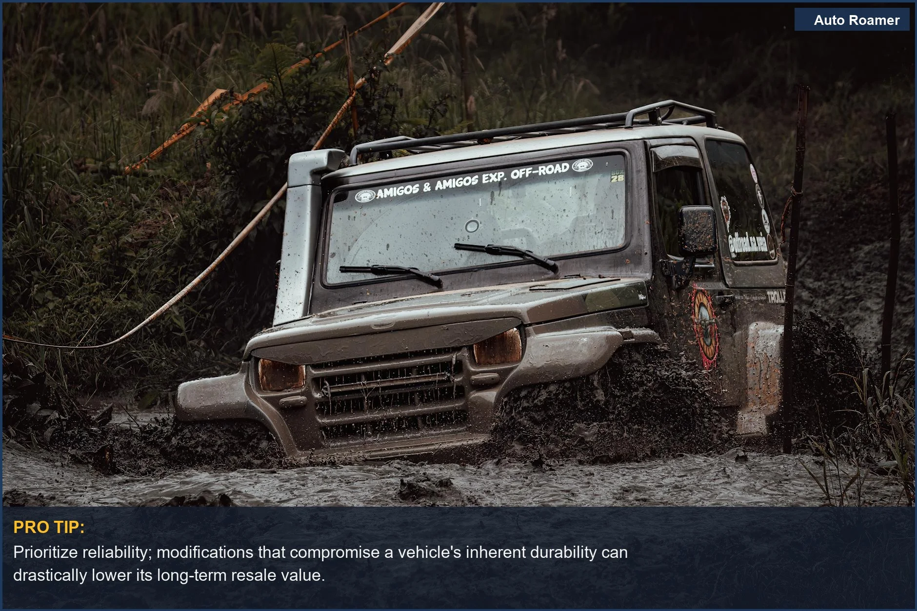 Rugged off-road vehicle tackling a muddy path, affecting resale value for overland builds.