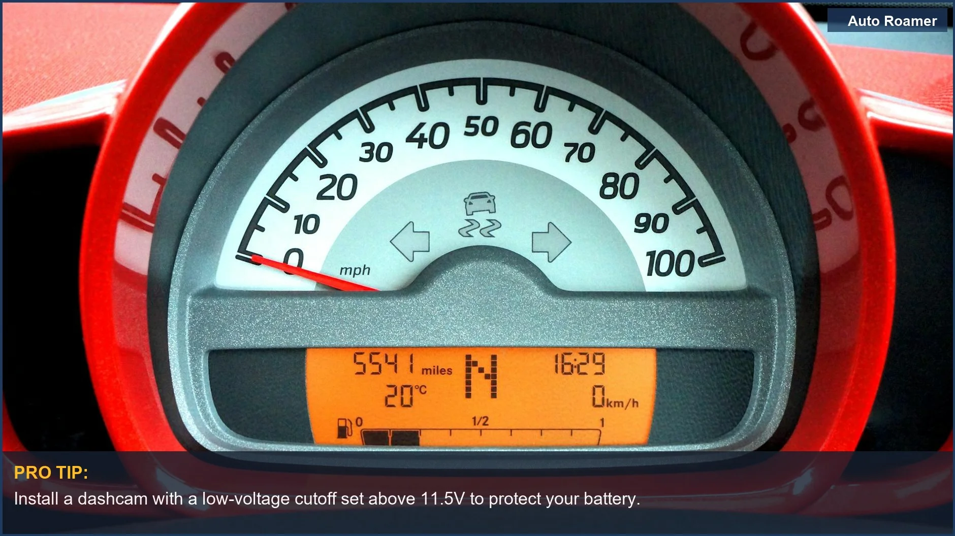 Detailed digital car dashboard display indicating various system statuses and potential battery load.