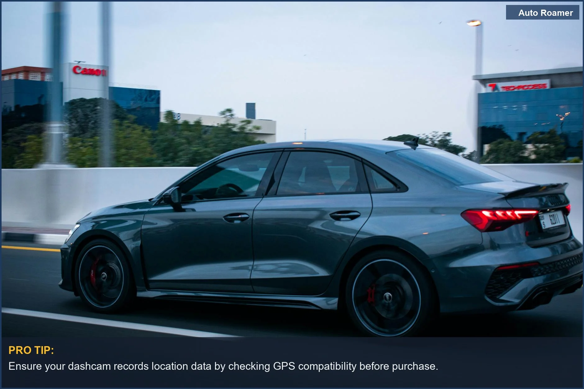 Sleek Audi car speeding on an urban street, emphasizing modern design and dashcam features.