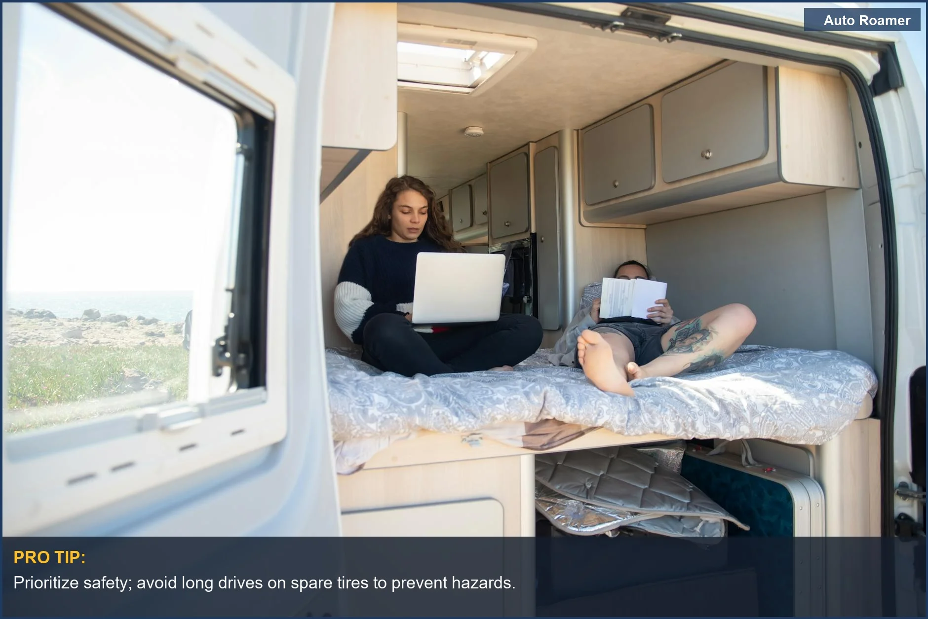 Couple relaxing in their motorhome, one using a laptop while the other reads, reflecting on spare tire safety.