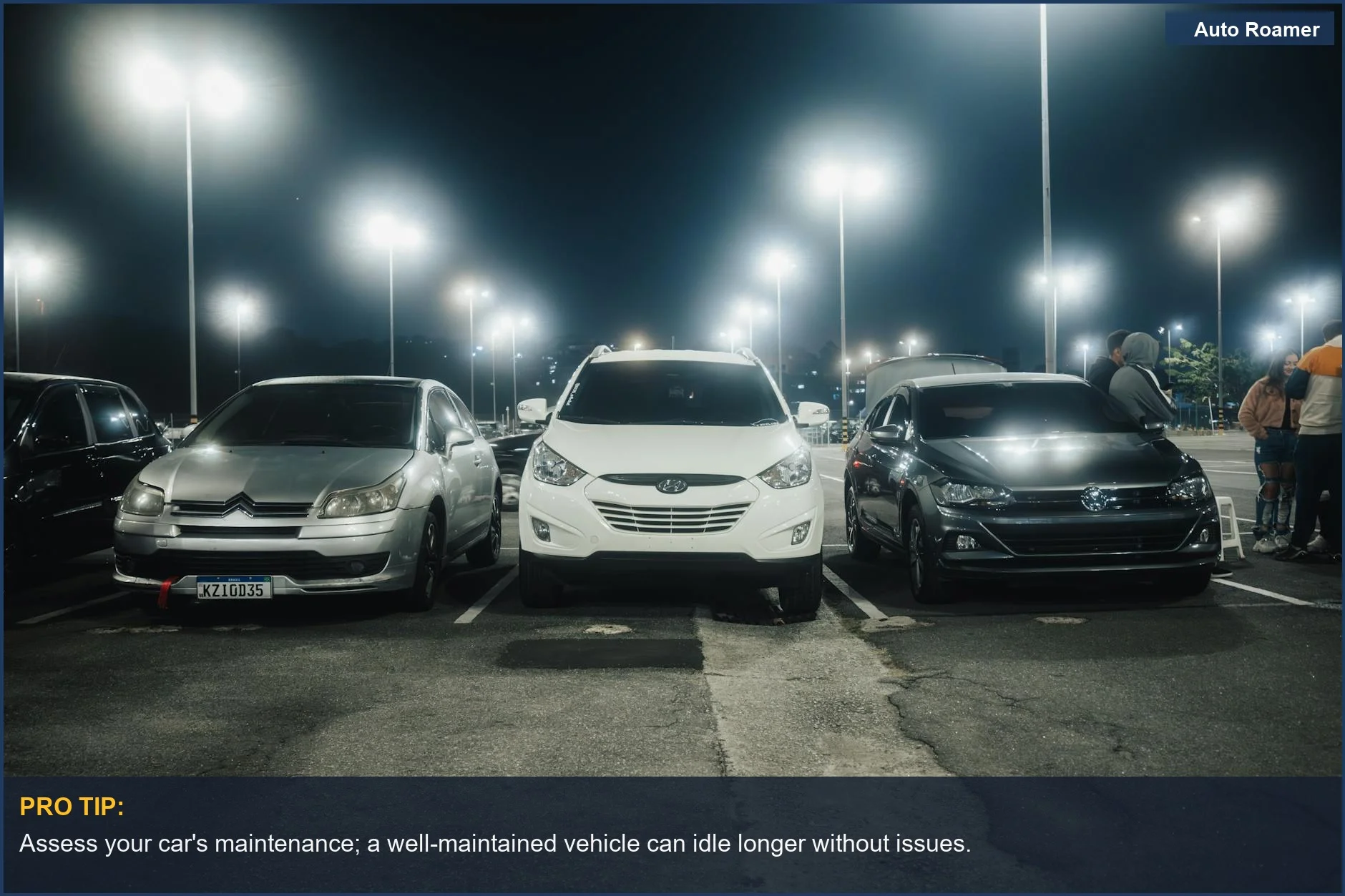 Well-lit parking lot filled with various parked cars under street lamps.