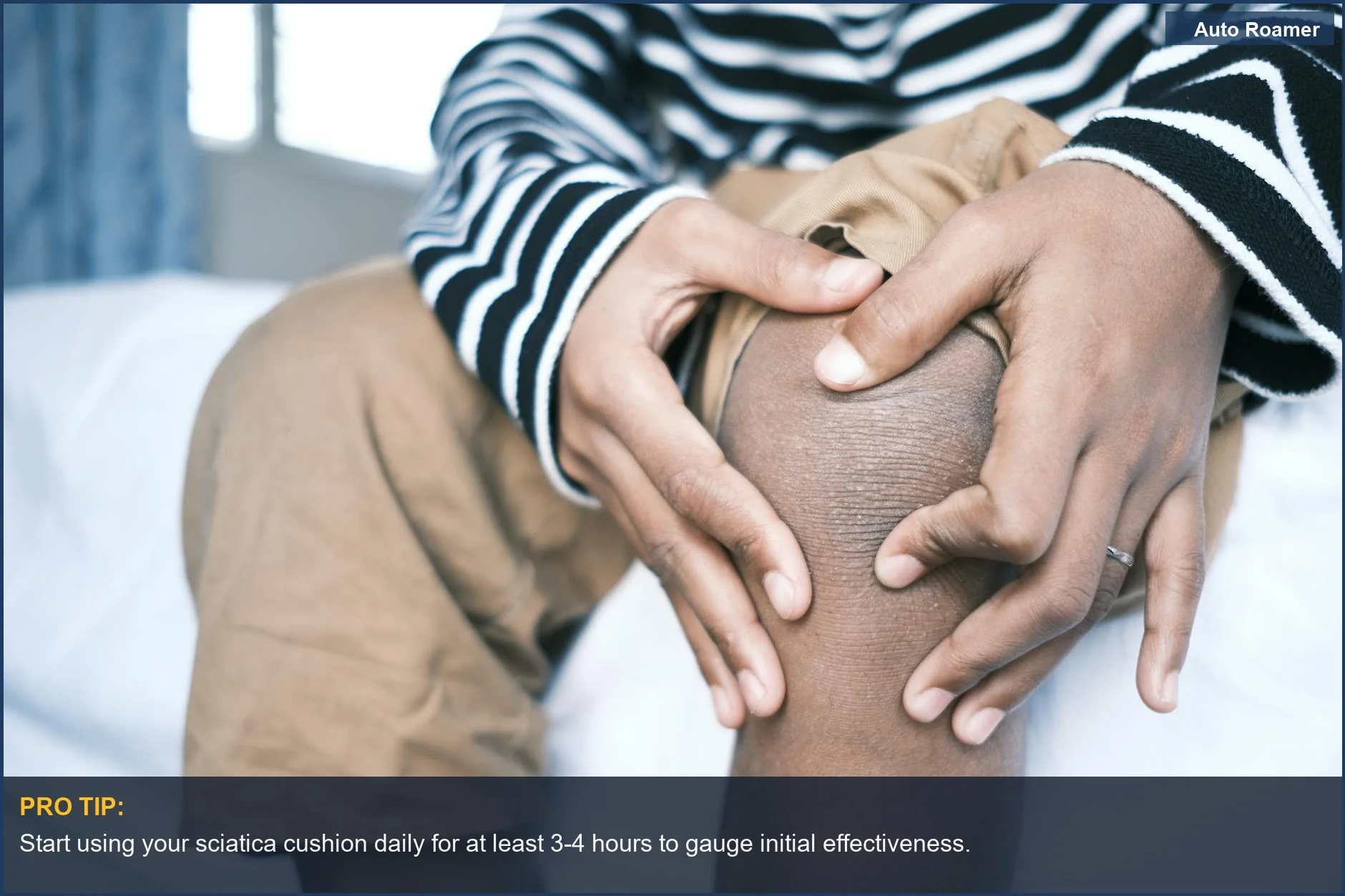 Person experiencing sciatica pain, holding knee with striped clothing, seeking back pain relief.