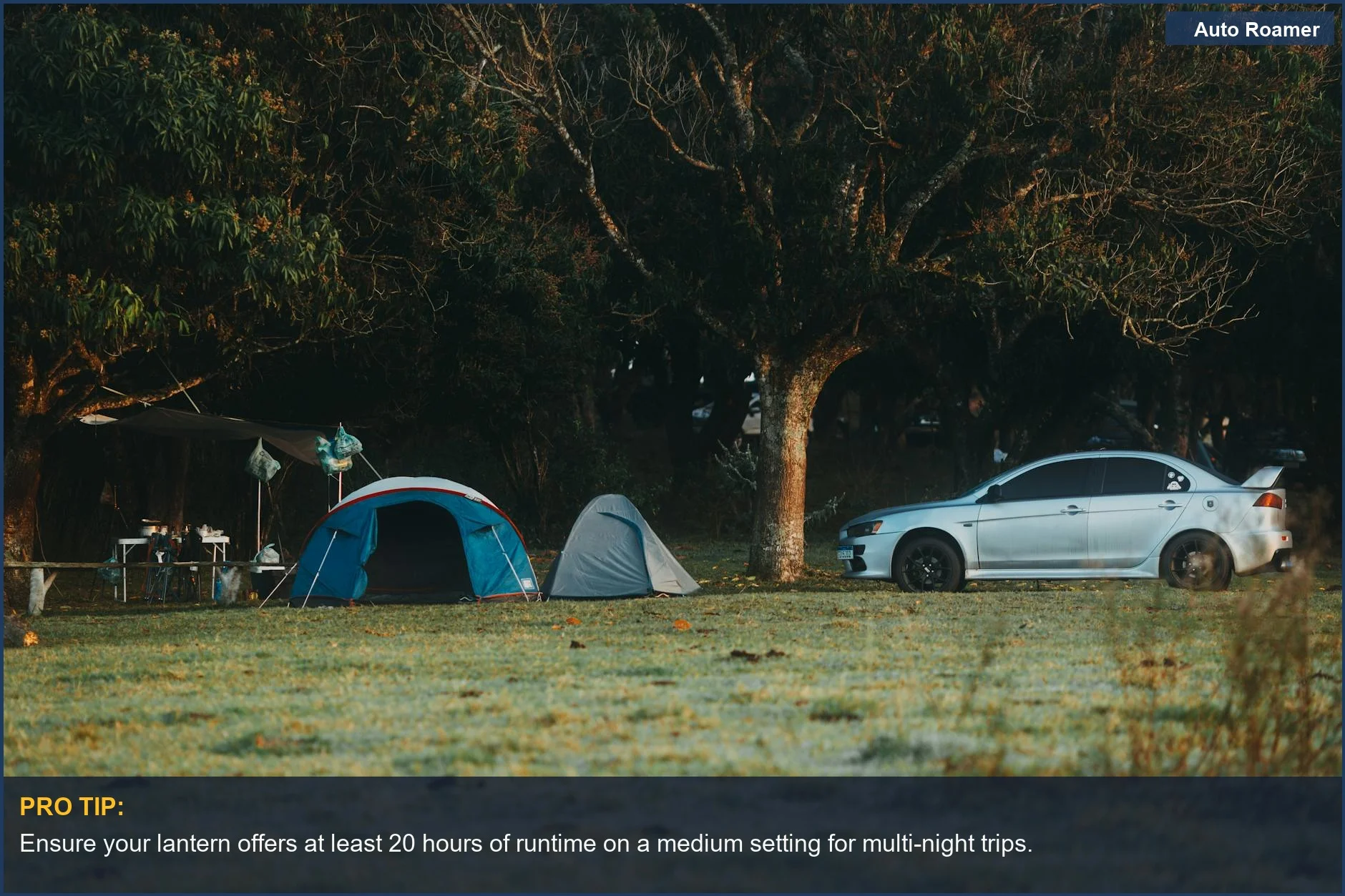 Idyllic car camping scene with tents and car in a serene forest, highlighting essential rechargeable lantern battery life.