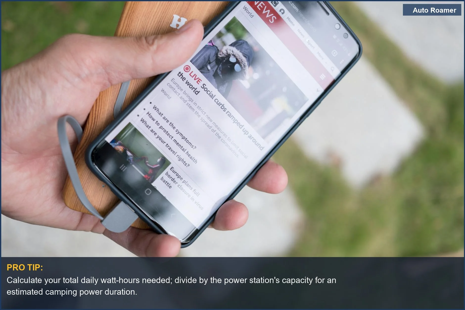 Illustrating power station battery life, a hand charges a smartphone outdoors, showing device power consumption impacts runtime.