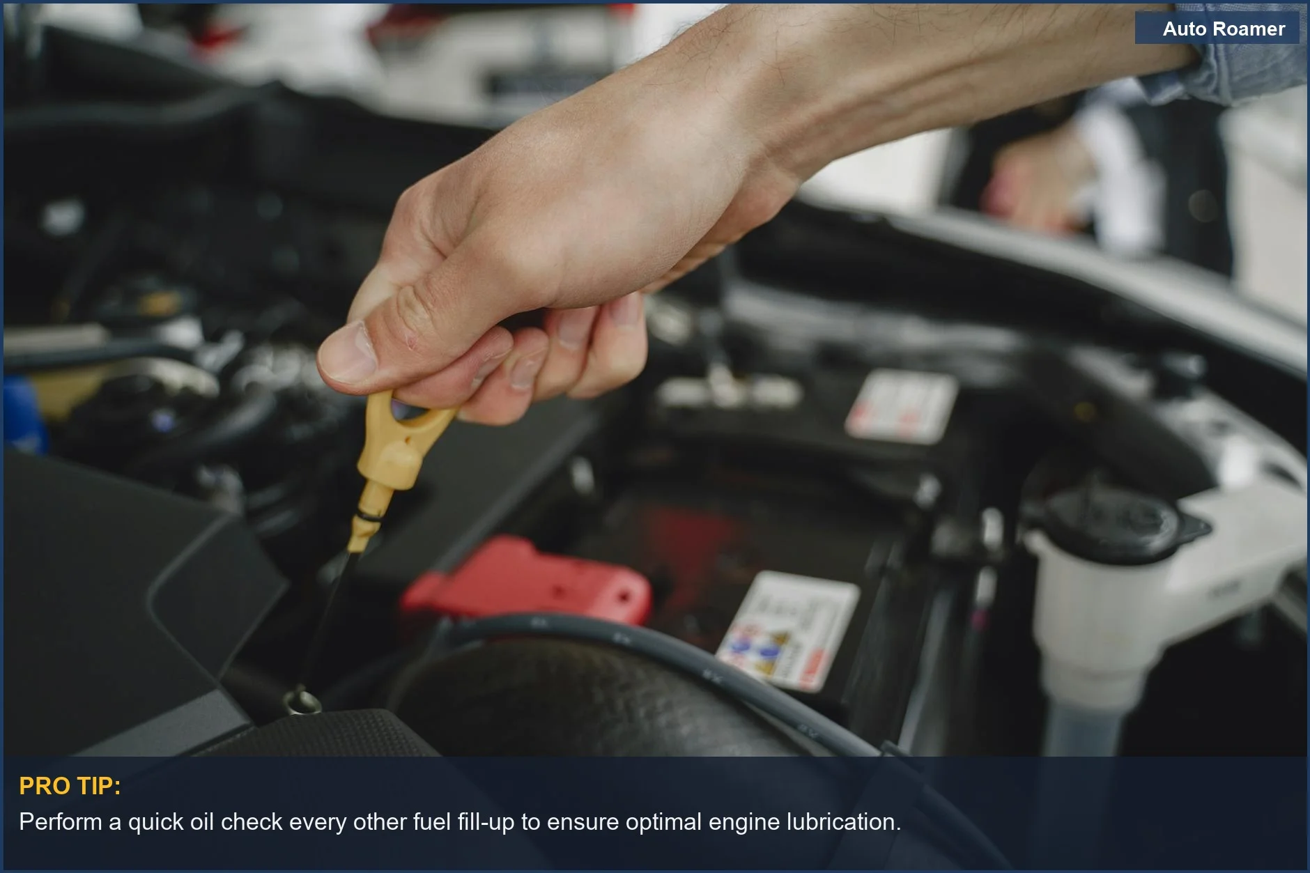 Close-up of a hand checking a car's oil dipstick for maintenance and diagnostics, emphasizing regular checks.