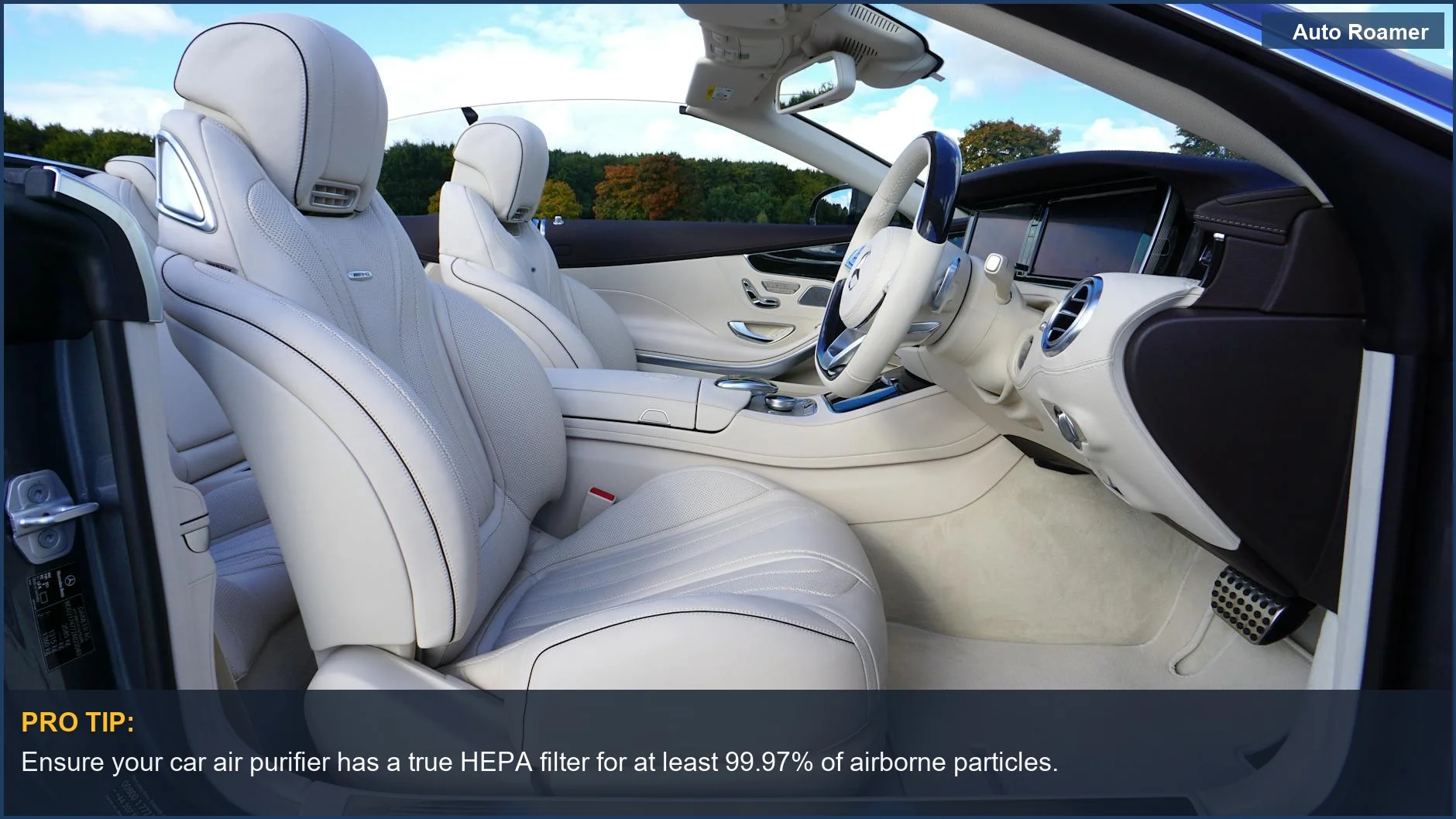 Elegant Mercedes convertible interior with cream leather seats, showcasing advanced car air purifier technology.