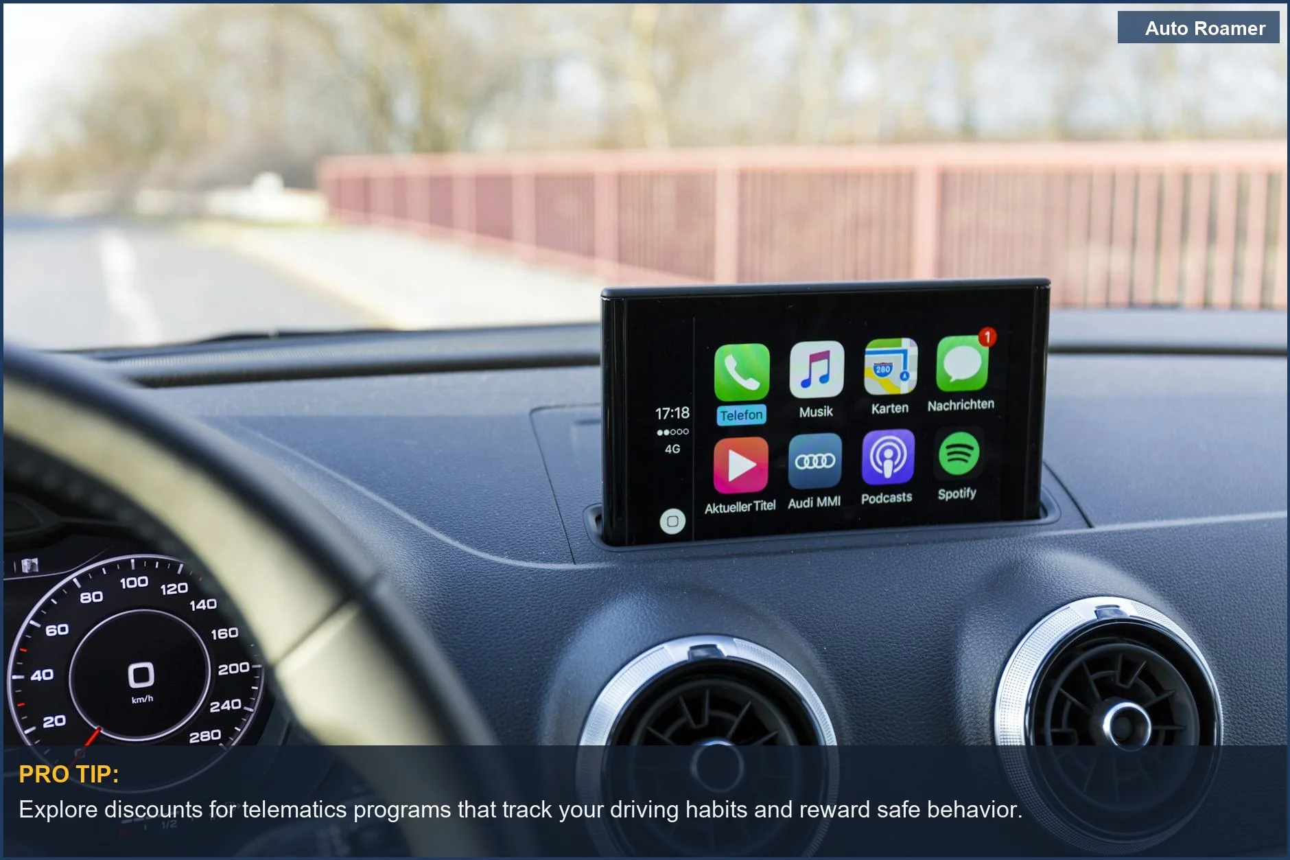 Modern luxury car interior with advanced digital navigation and audio display impacting insurance costs.