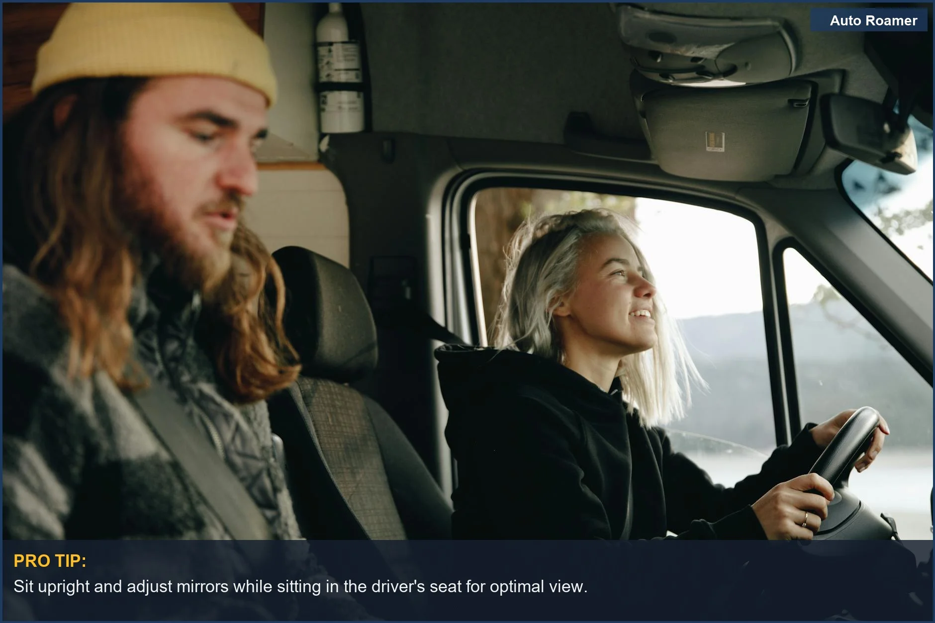 Couple enjoying a road trip in a camper van, highlighting practical driving adjustments.