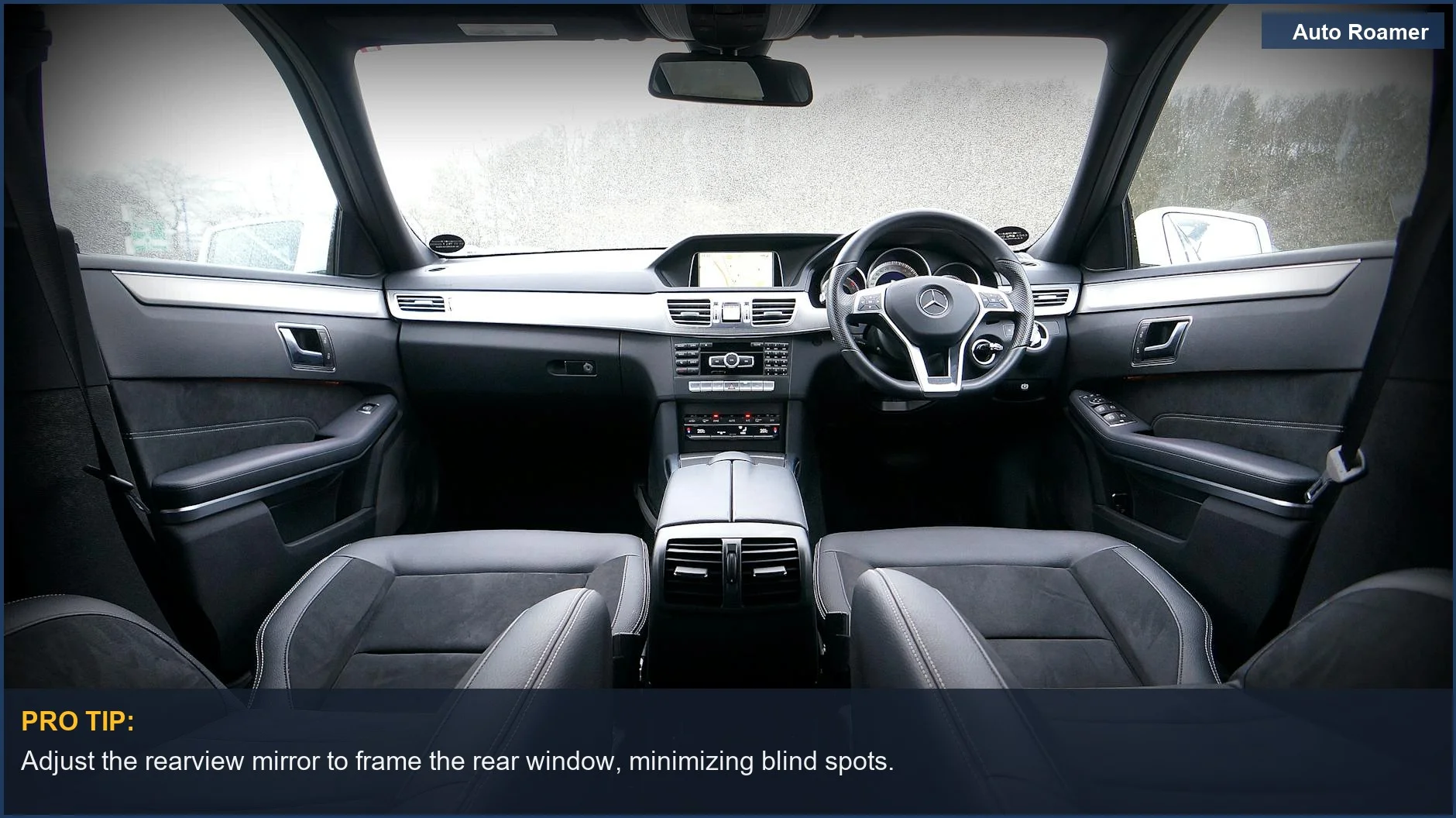 Modern car interior with leather seats and a sleek dashboard for proper mirror adjustment.