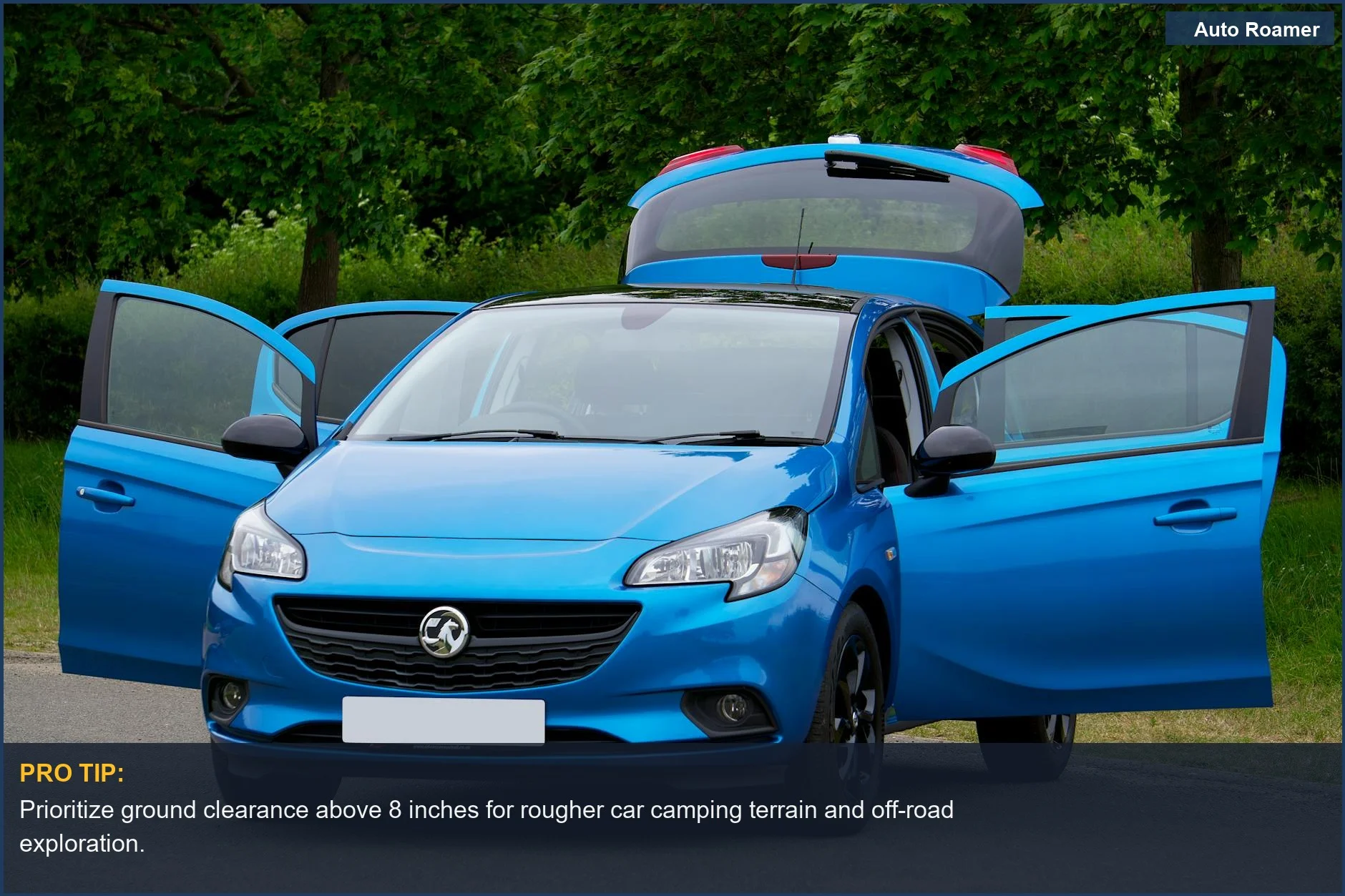 Vibrant blue car parked on a forest road, ideal for assessing car camping platform suitability.