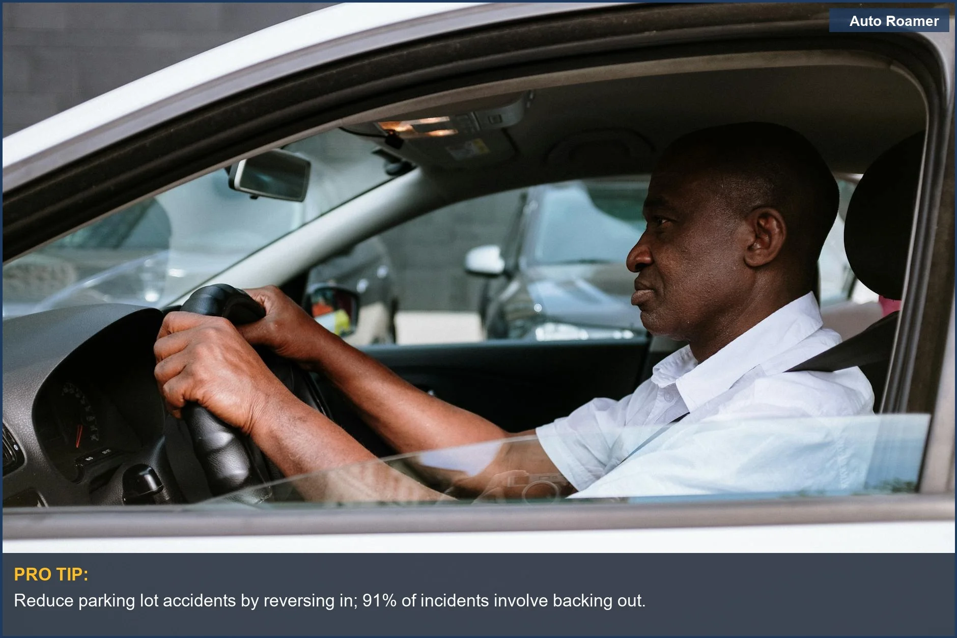 Focused adult man driving a car, demonstrating concentration for the reverse park technique.