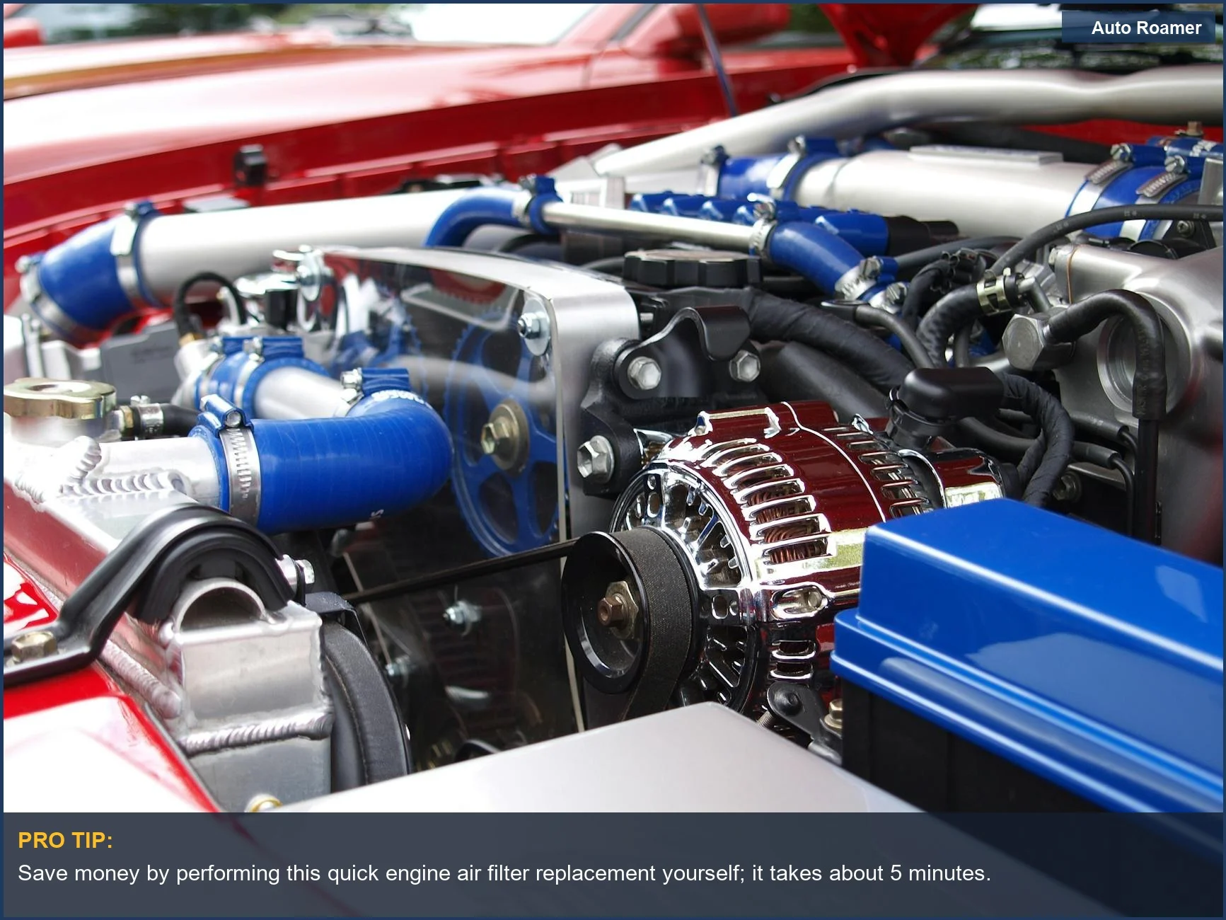Modern car engine bay with colorful components, highlighting the importance of engine air filter replacement.