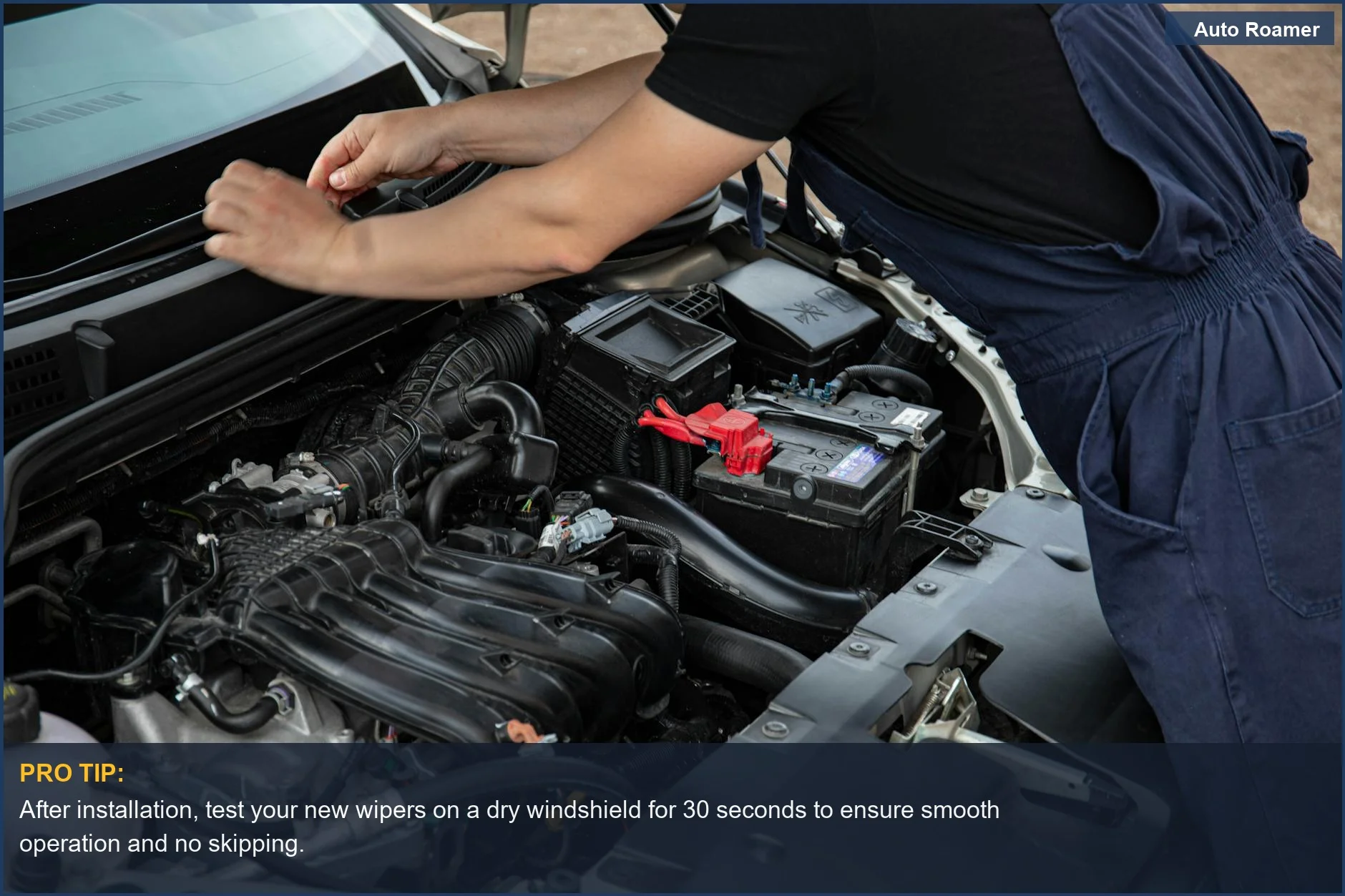 Car mechanic working on a vehicle's engine outdoors, symbolizing the general upkeep involved in car maintenance.