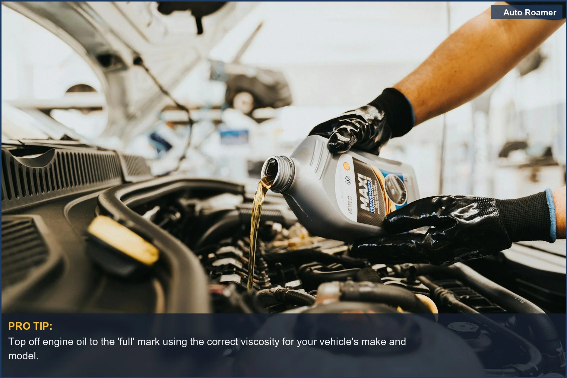 Close-up of mechanic pouring engine oil, essential for how to check car oil level.