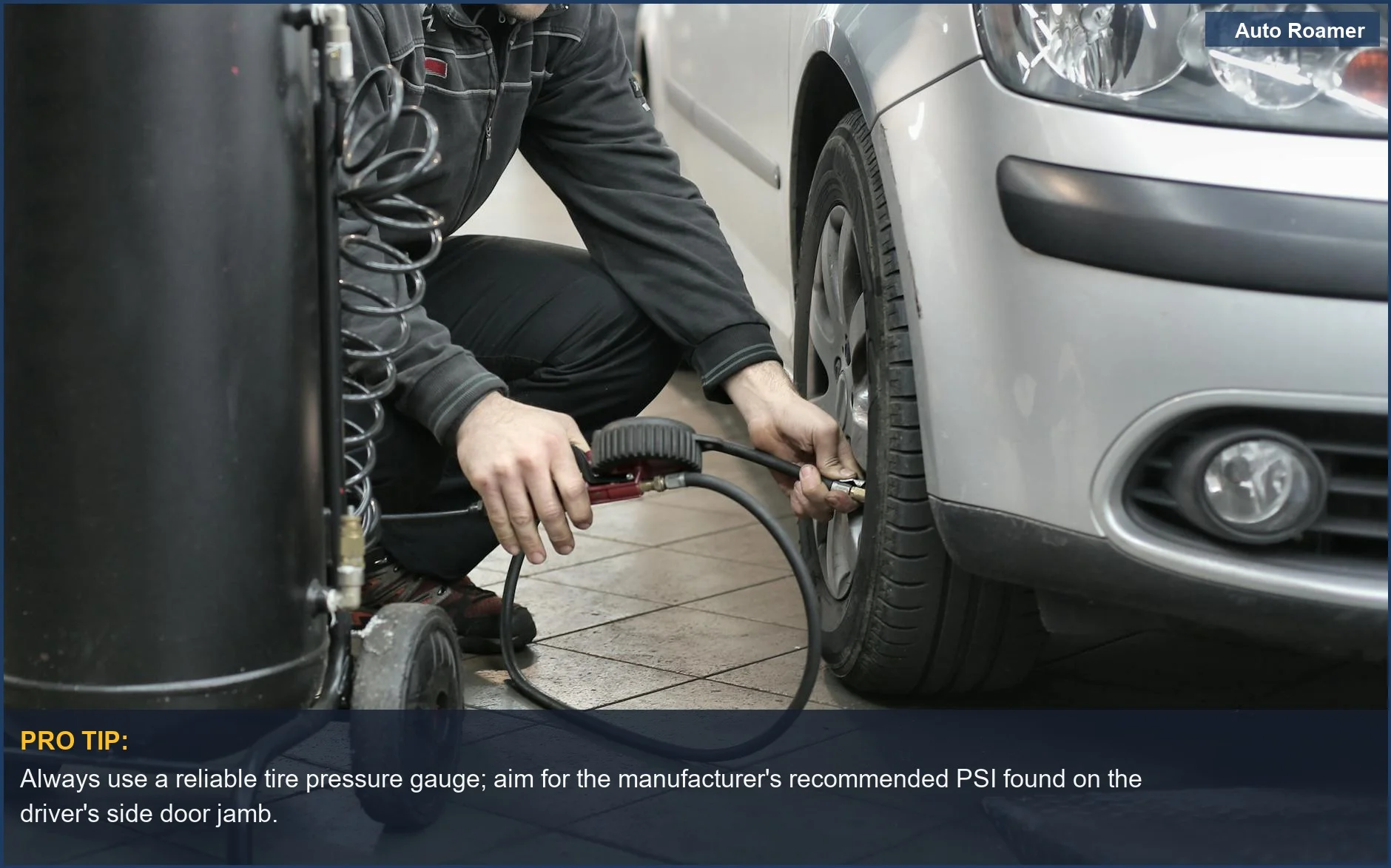 Mechanic inspecting tire pressure in an auto shop, a reminder to use a gauge for accurate readings to check tire pressure.