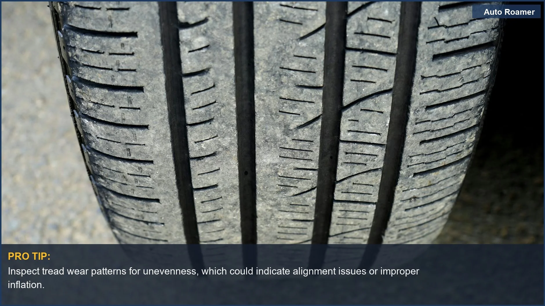 Close-up of worn tire tread with visible wear and texture, illustrating the need to check tire tread depth.