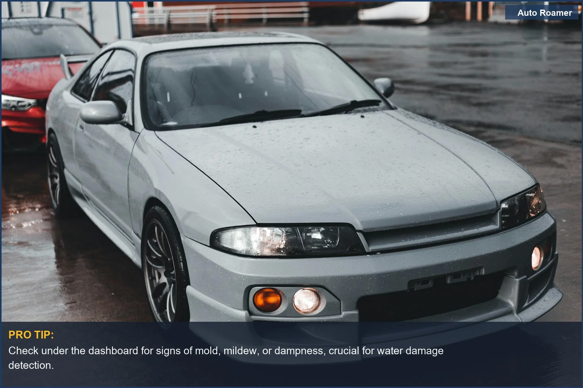 Gray sports car on a wet road, emphasizing the need to detect hidden water damage before car camping conversion.