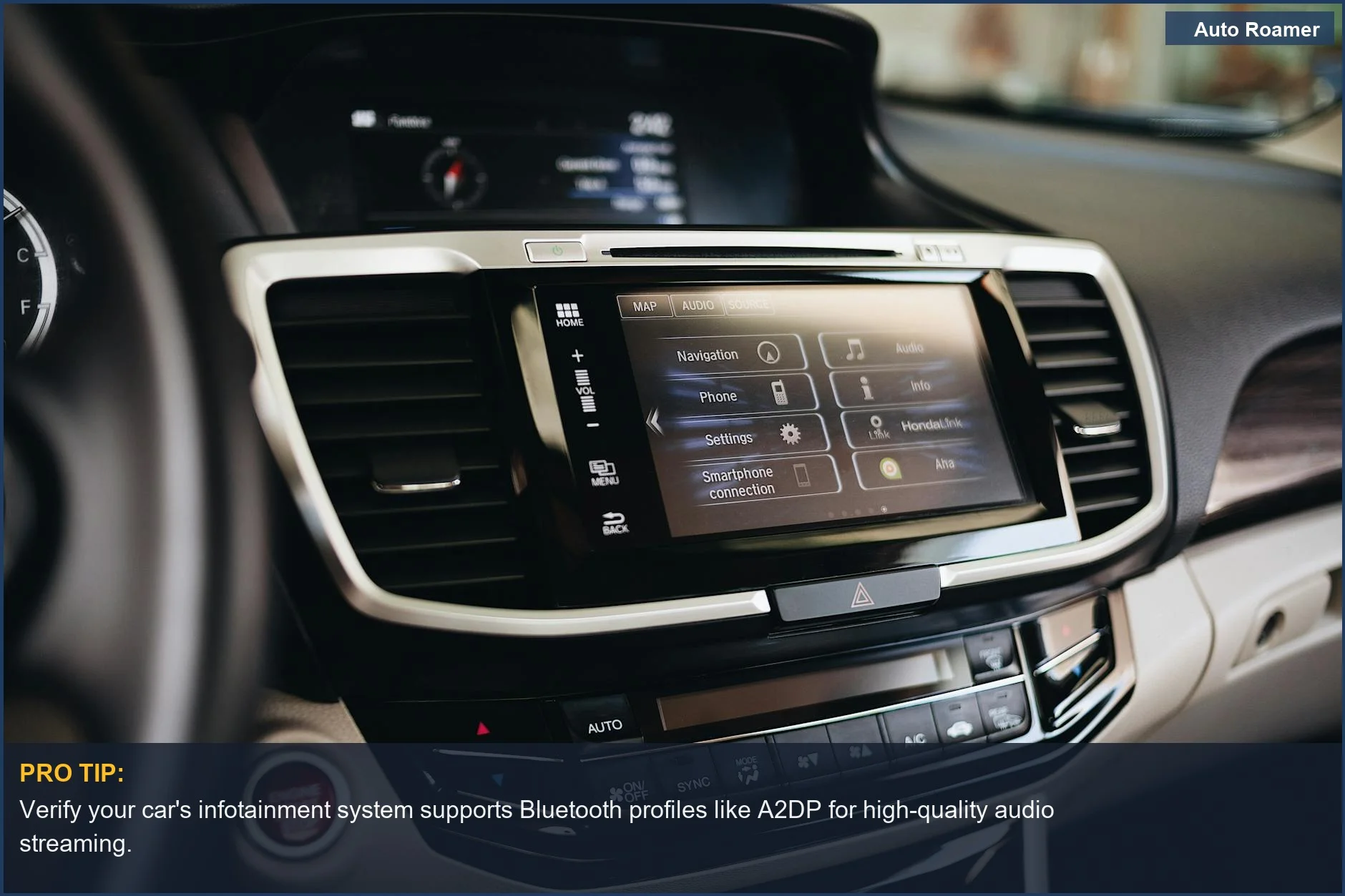 Close-up of a car's infotainment screen showing navigation and smartphone connectivity options for better car audio.
