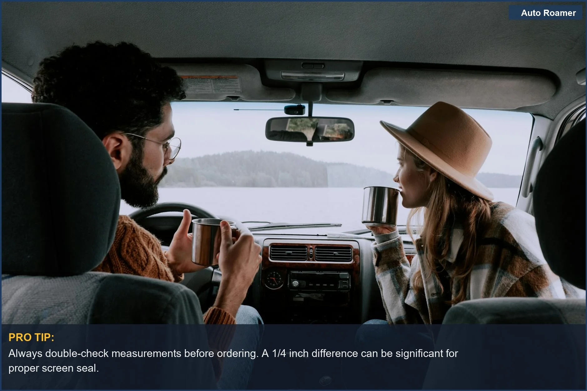 Couple enjoying hot drinks inside a car with a scenic lake view, showcasing comfortable car camping.
