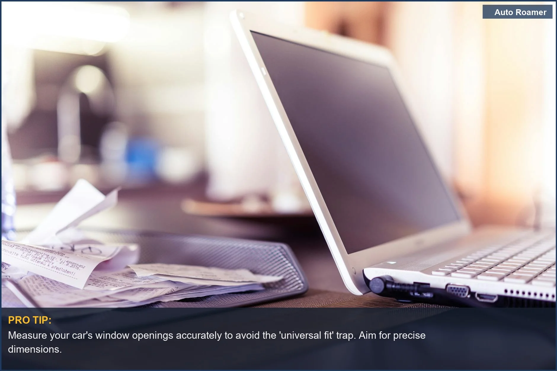 Close-up of receipts on a desk, illustrating the complexity of choosing car camping window screen size.