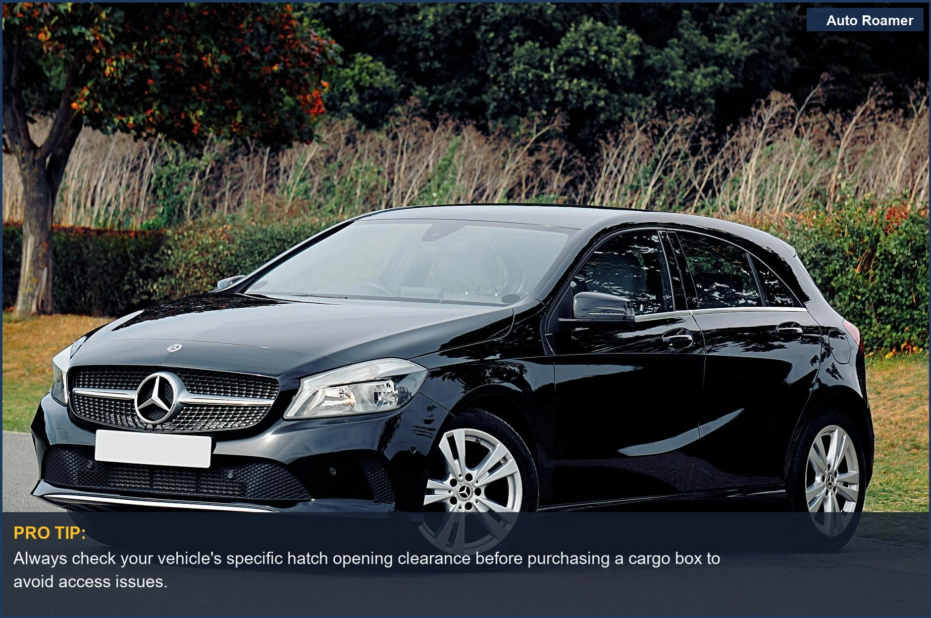 Elegant black Mercedes-Benz hatchback in a scenic UK location, highlighting the importance of vehicle compatibility for cargo carriers.