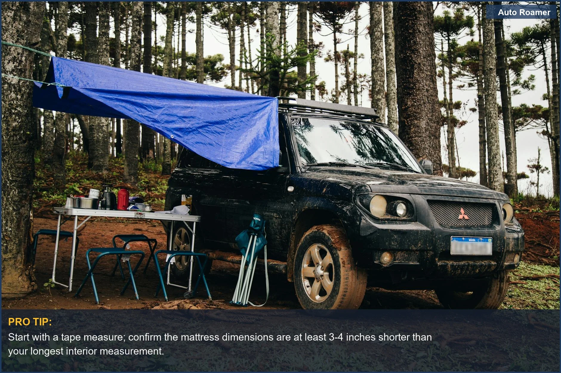 SUV in forest with camping gear, emphasizing the need for accurate air mattress dimensions for comfort.
