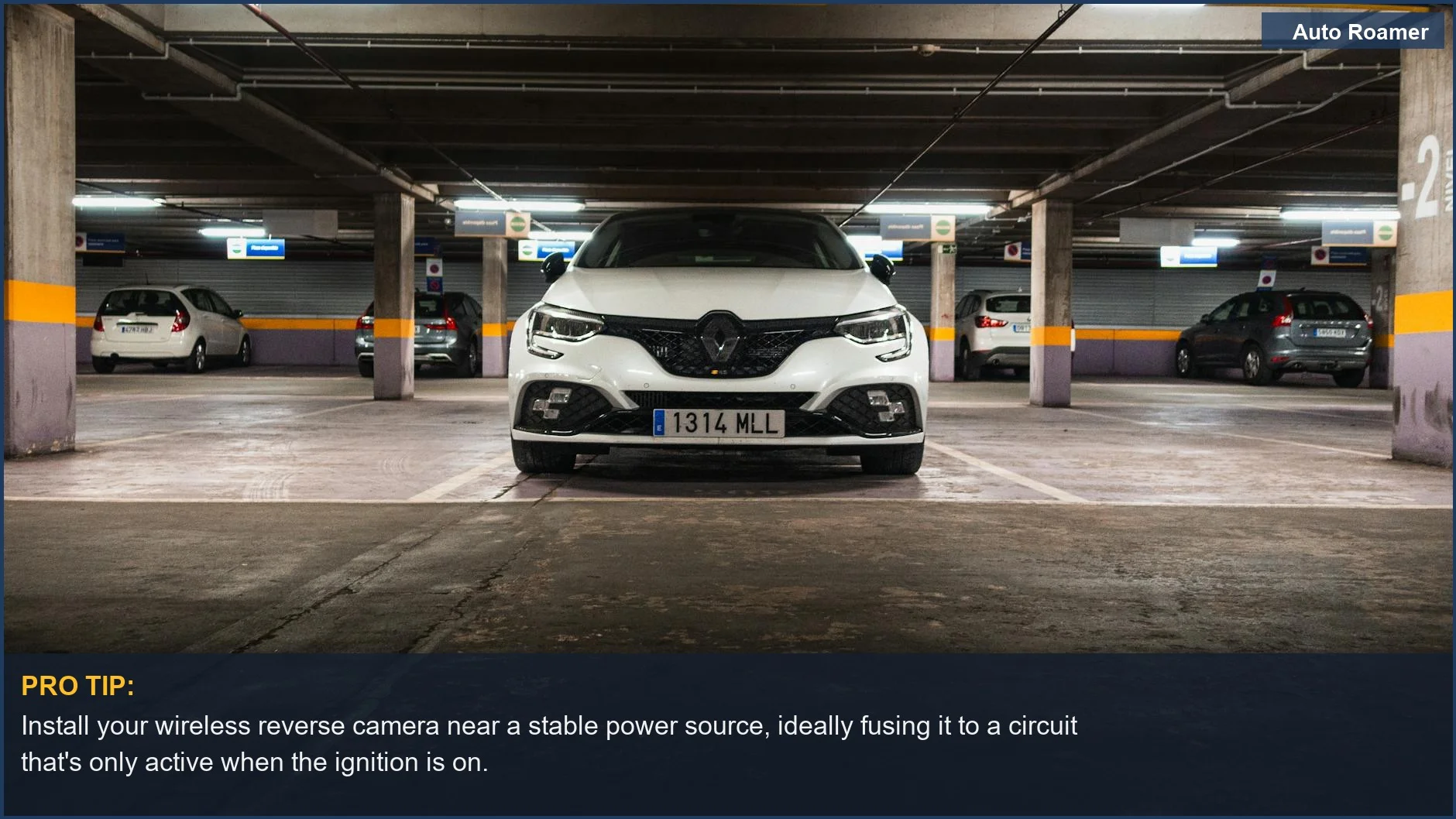 Sleek Mitsubishi interior at night, showcasing illuminated dashboard and steering wheel for reverse camera setup.