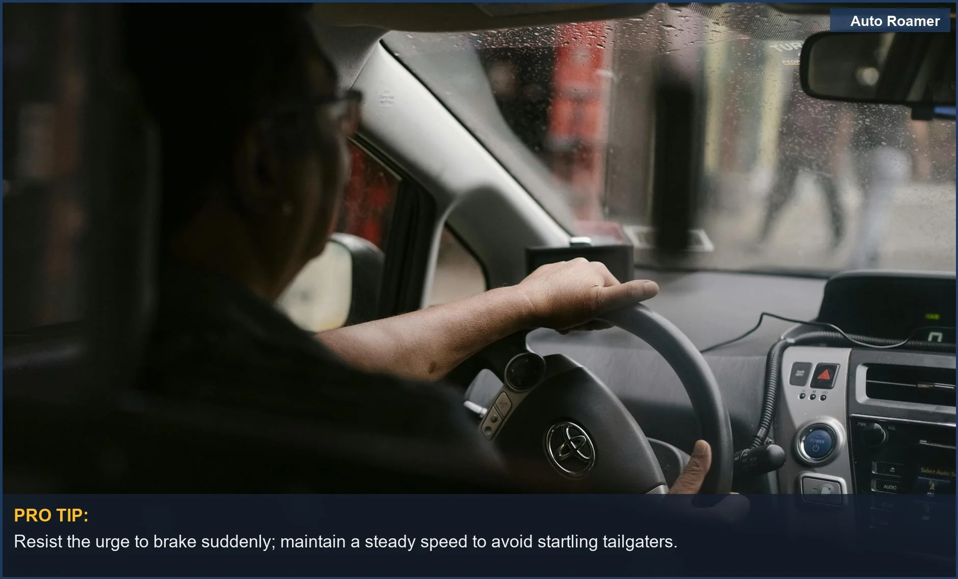 Man driving in rain, avoiding tailgaters for road rage safety tips.