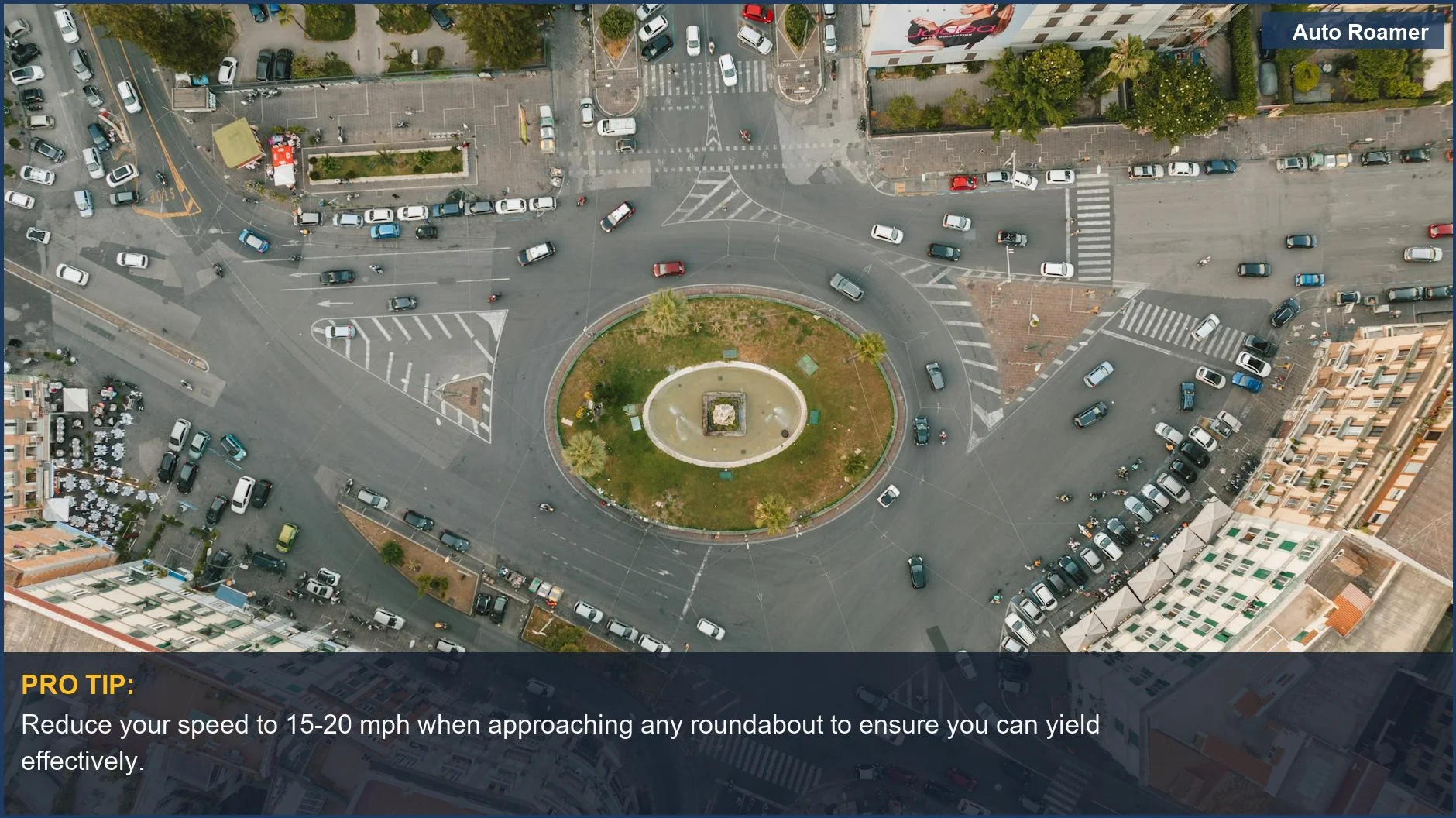 Busy urban traffic circle with cars and buildings, demonstrating roundabout rules.