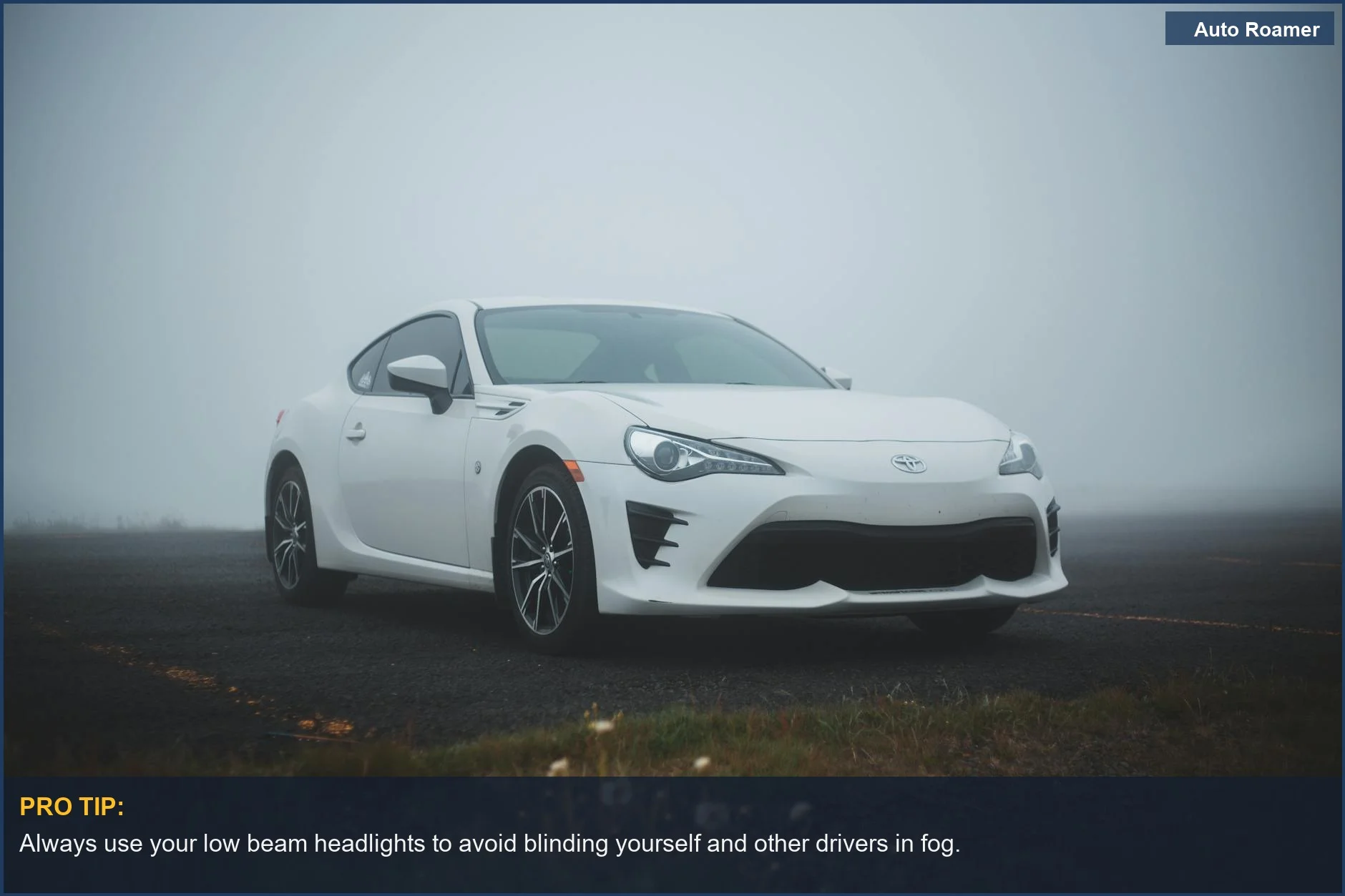 A white car parked on a rural road in thick fog, illustrating visibility challenges for drivers.
