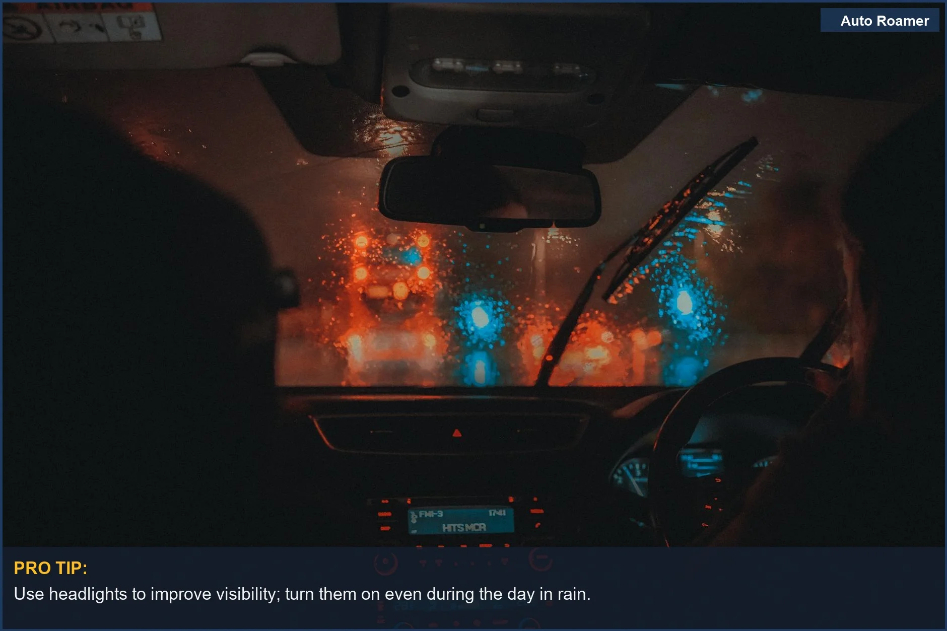 Cinematic view from a car interior driving through Manchester at night in the rain, showing visibility challenges.