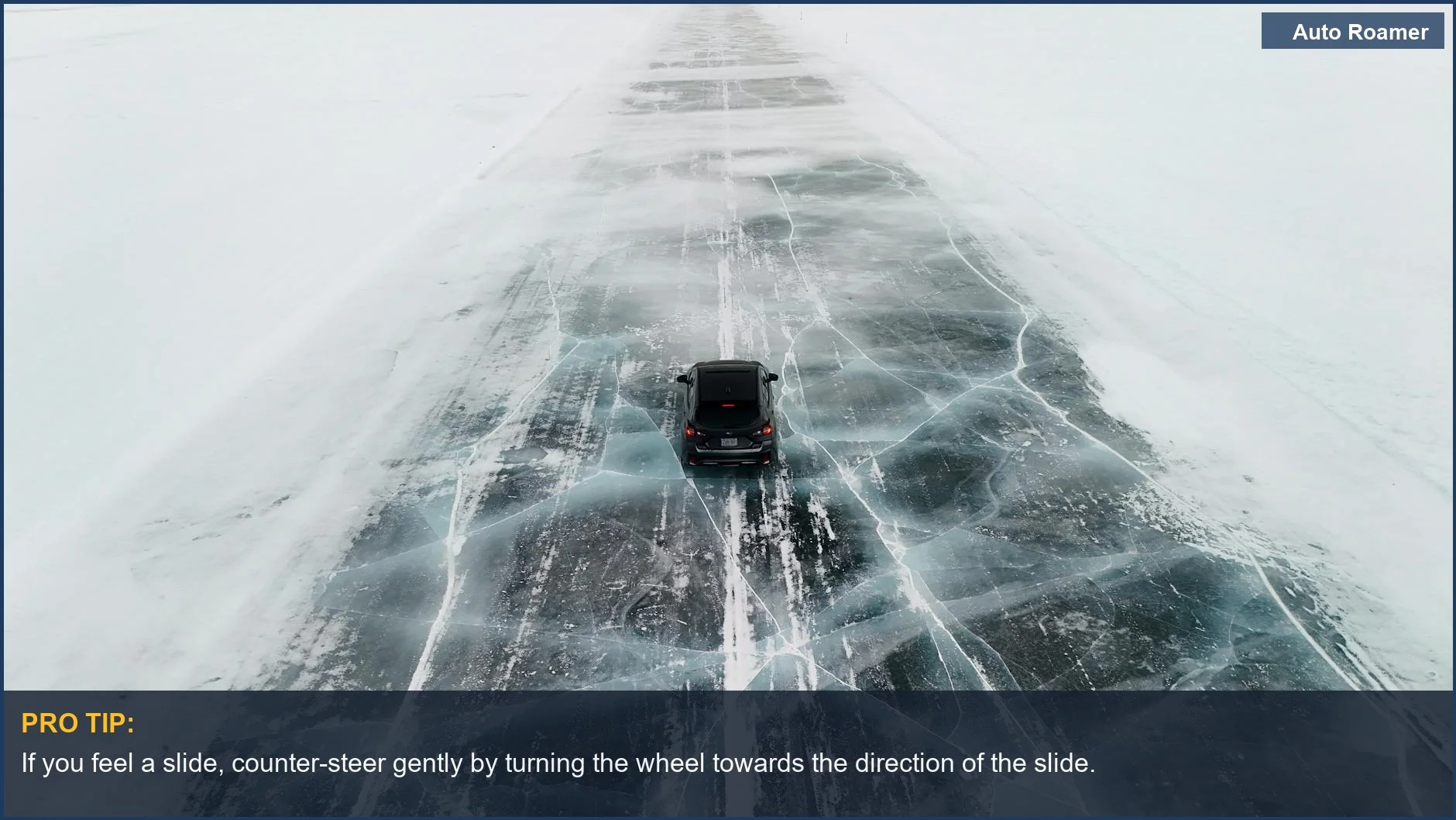 Aerial view of a car driving on a frozen Canadian road, a key element of driving on ice.