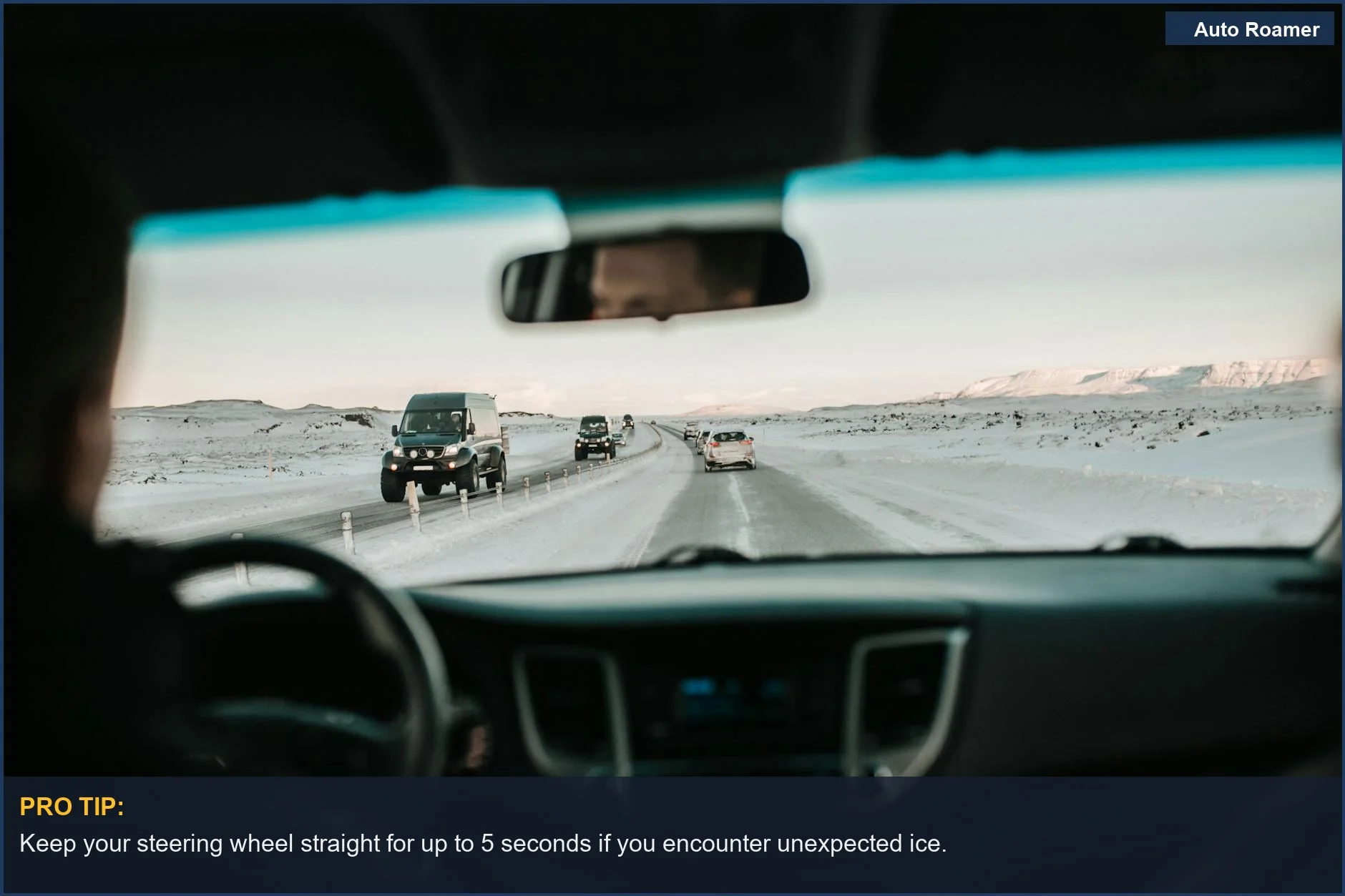 View from inside a car on a snowy mountain pass, illustrating techniques for driving on black ice.