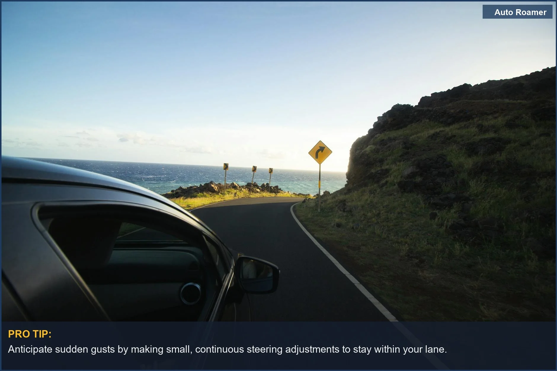 Driving along a scenic coastal road with ocean views and curves, demonstrating driving in crosswinds.