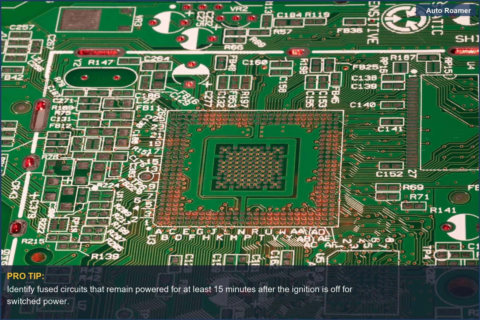 Close-up of a detailed green printed circuit board with visible components, key to dashcam hardwiring.