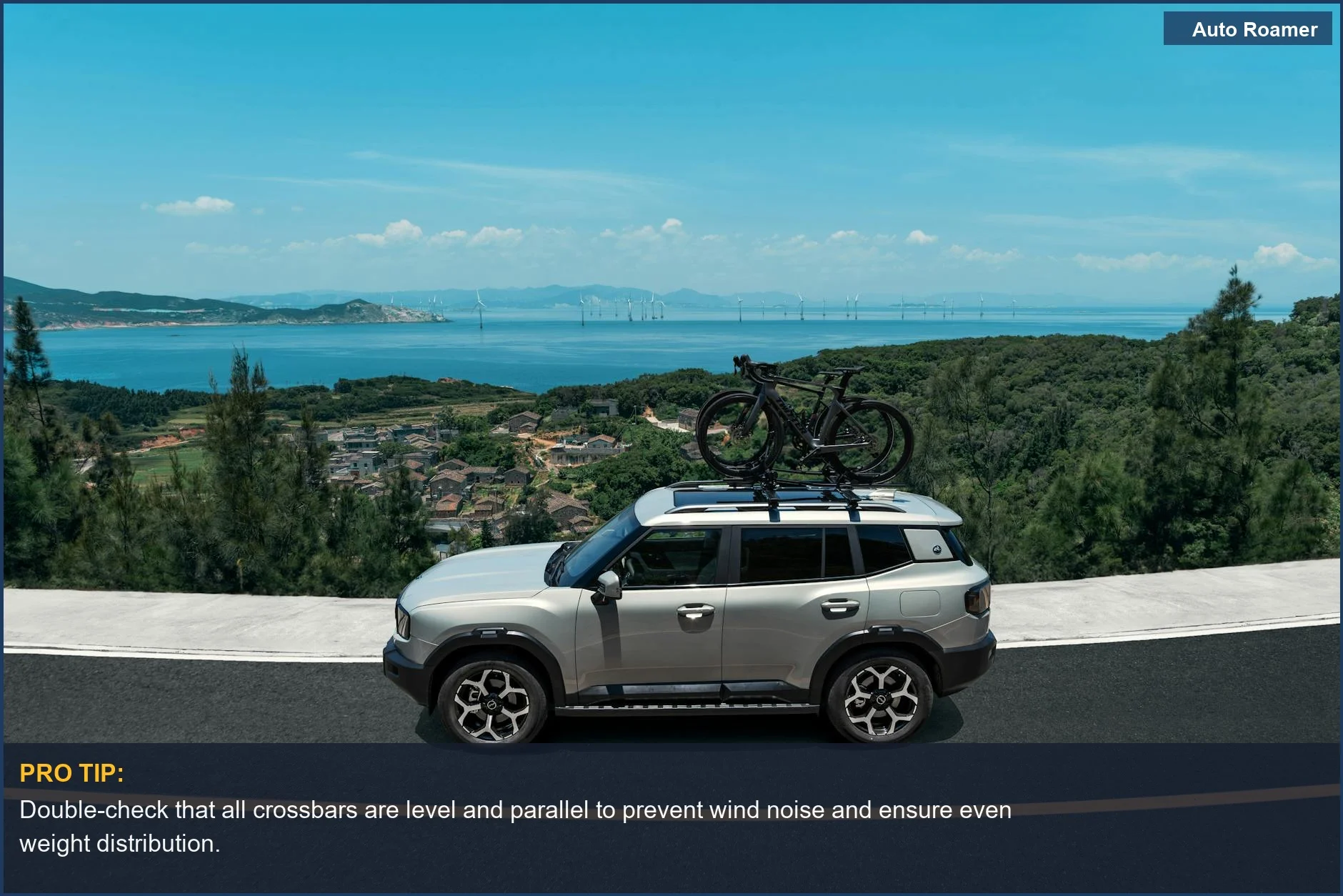 Silver Hyundai Santa Cruz hauling kayaks on a roof rack along a scenic coastal highway.