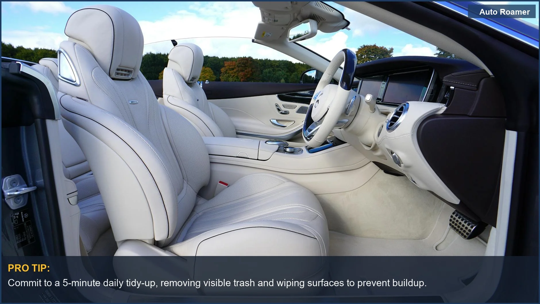 An elegant Mercedes convertible with cream leather interior, showcasing how to keep car tidy on road trip.