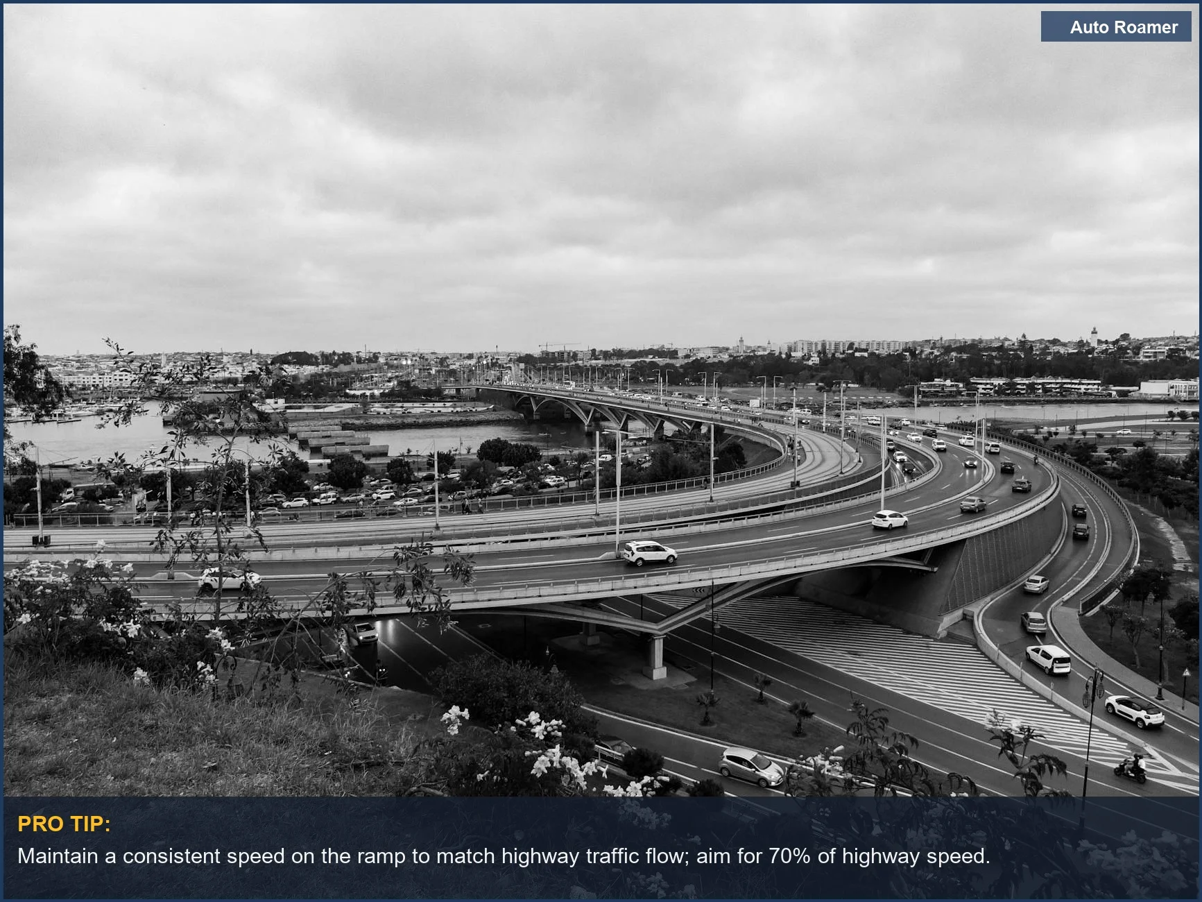 Busy urban highway interchange with flowing traffic, illustrating the challenge of merging onto a highway.