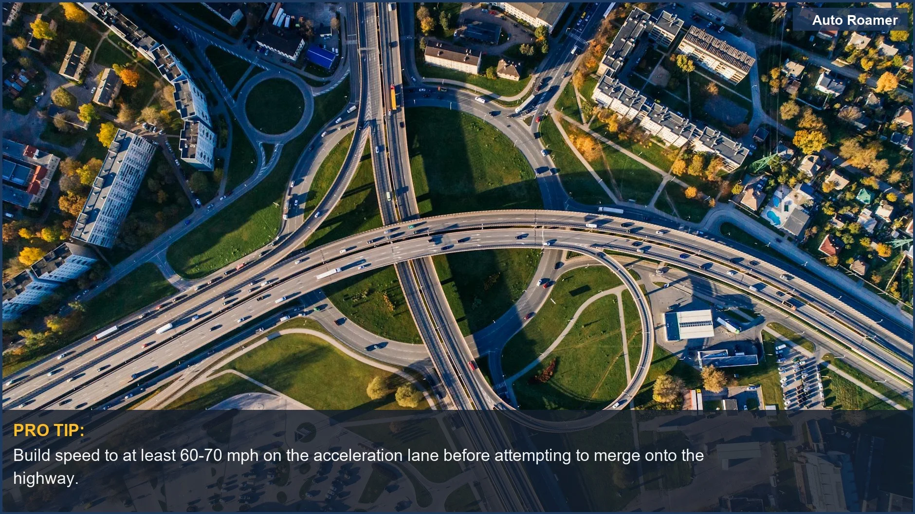 Aerial view of a complex highway intersection, showing the need to accelerate to highway speed for confident merging.