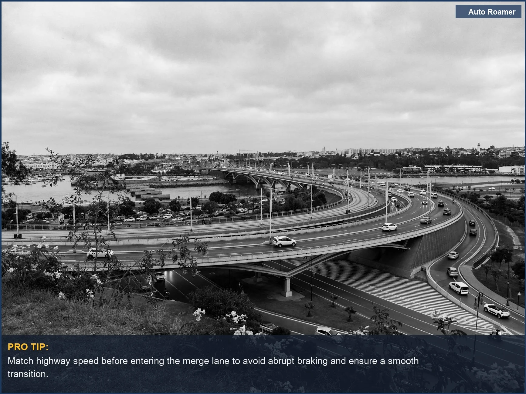 Busy urban highway interchange with flowing traffic, illustrating the challenge of merging onto a highway safely.