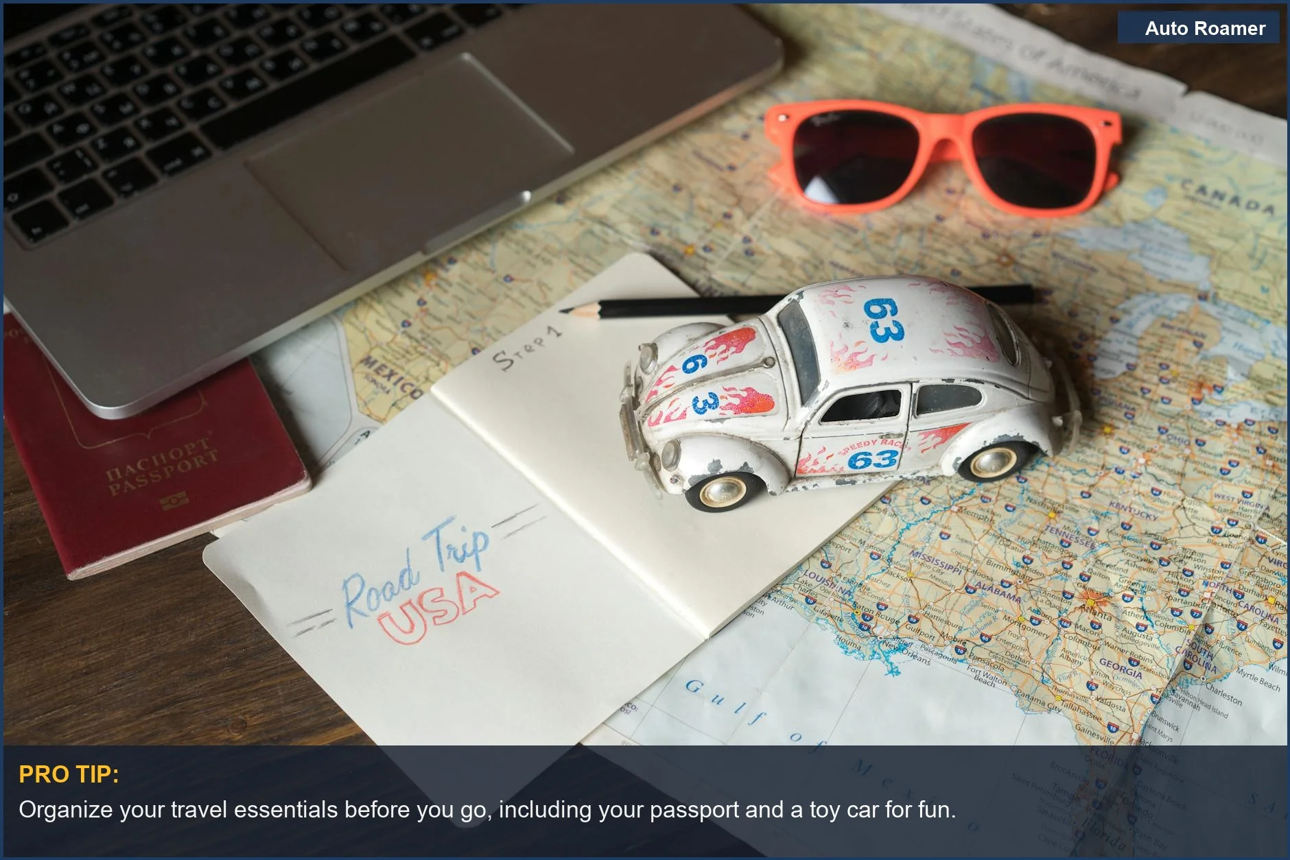 Road trip plan laid out with maps, passport, and toy car for budget travel.