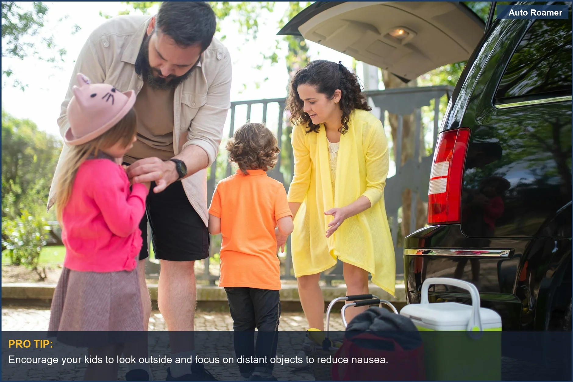 Cheerful family loading a car for a sunny day trip, highlighting excitement and preparation against car sickness in kids.