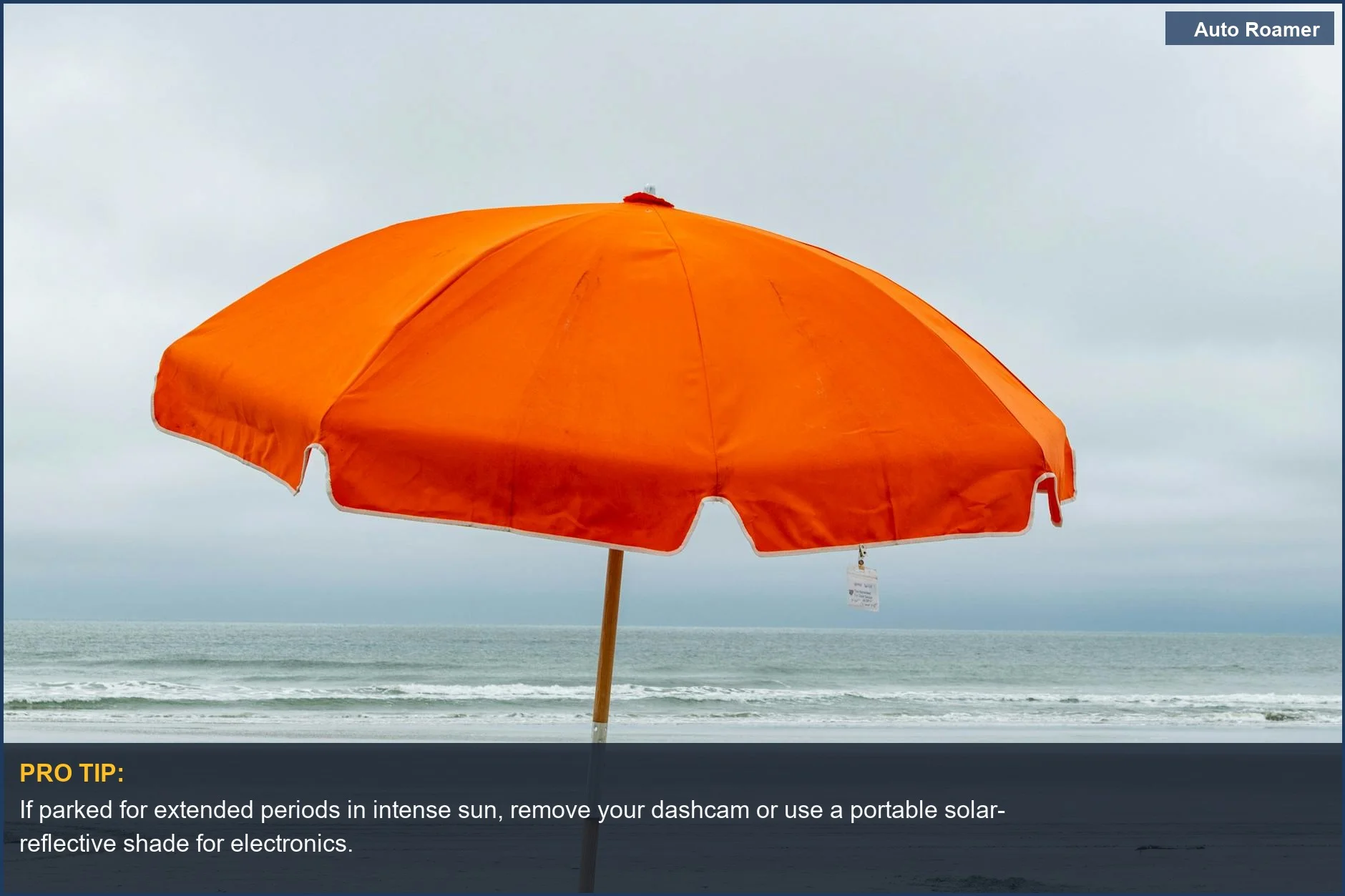 A vibrant orange beach umbrella offers a visual metaphor for crucial dashcam heat protection methods needed on hot days.